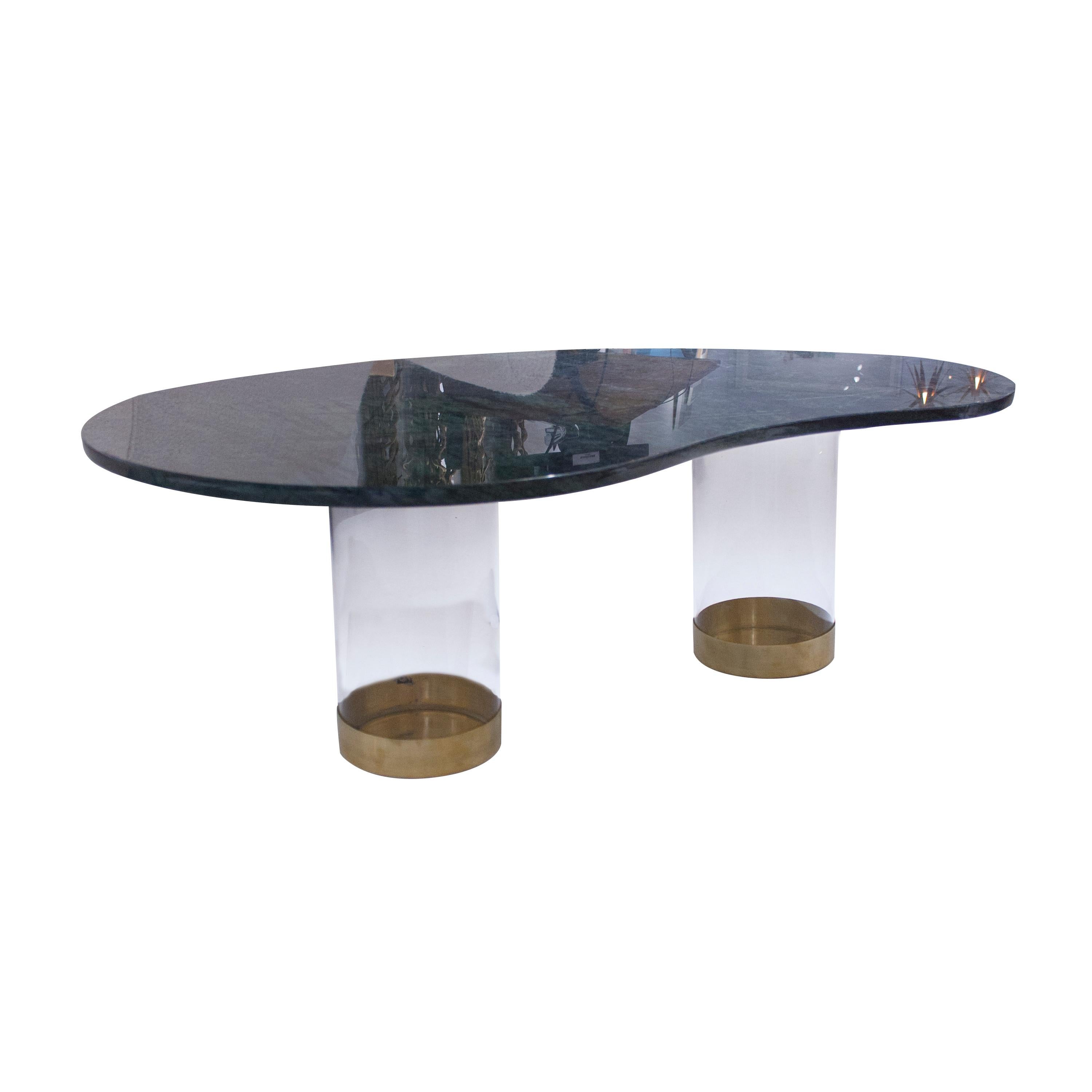 Contemporary center table designed and produced by IKB191 composed of a kidney shaped top in gtreen marble and a methacrylate structure with brass details.
  