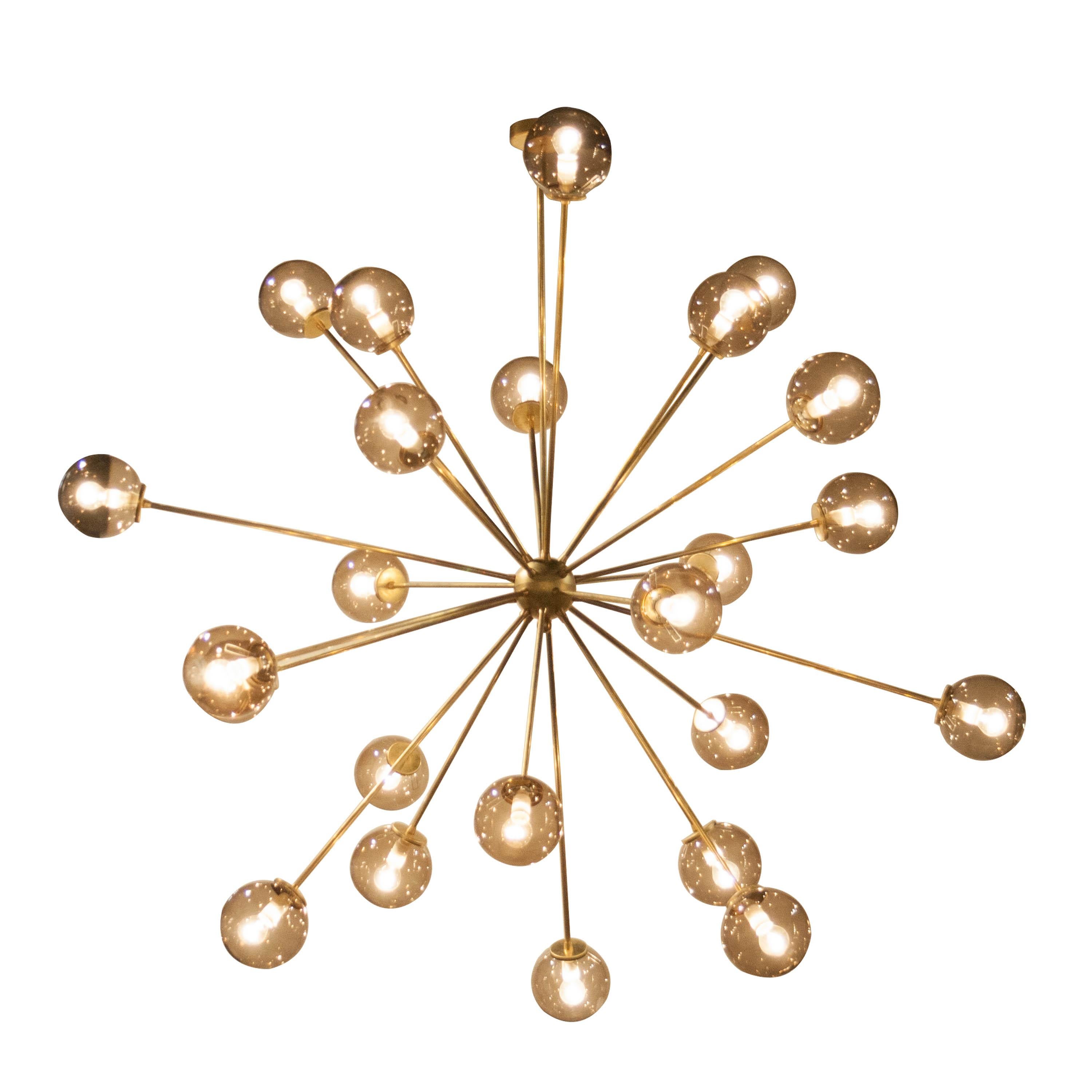 Contemporary suspension lamp, designed by IKB191, with brass structure, and 24 smoked glass tulips, Spain, 2020.
 