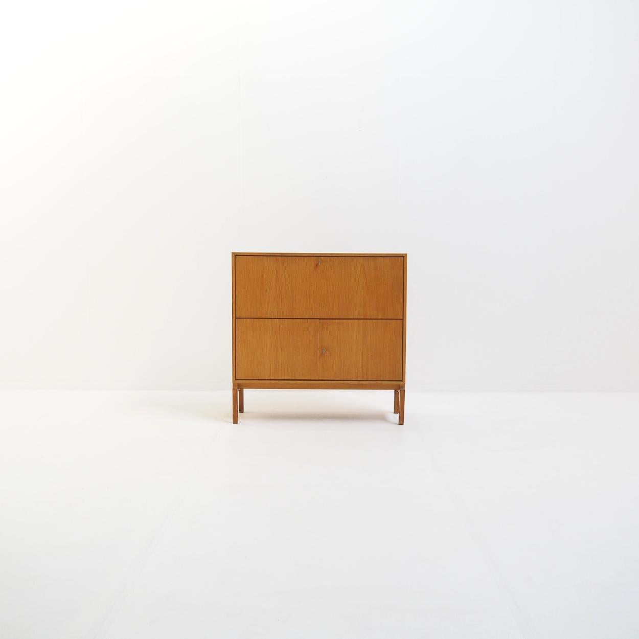 Beautiful IKEA cabinet that was initially designed as a wedding gift for Ingvar Kamprad, the founder of IKEA.

The cabinet is made of natural oak veneer with all edges in full oak, which limits the damage. The cabinet has acquired a beautiful warm