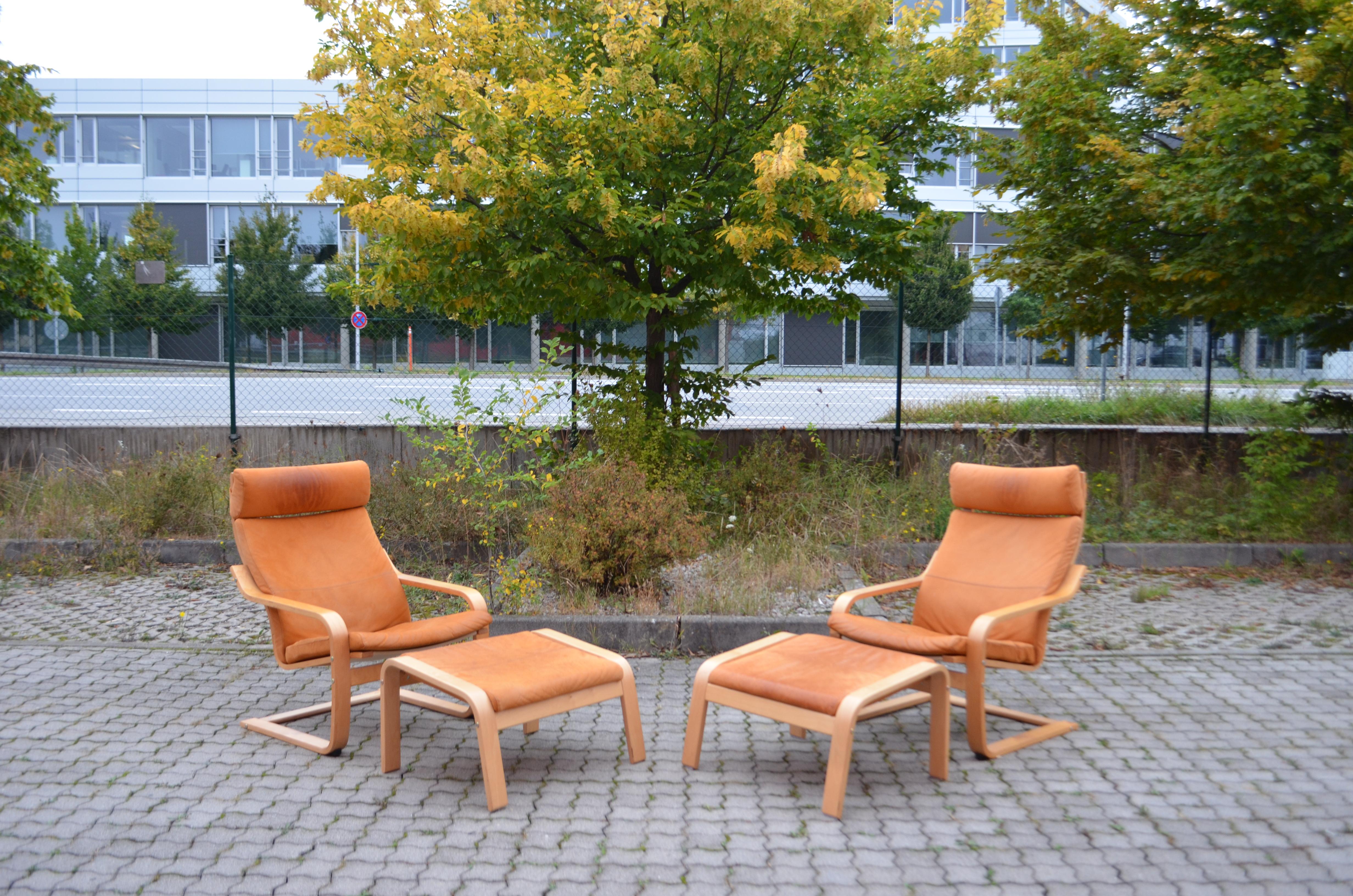 The Ikea Cantilever Modell Poäng is a classic one. 
It was designed by Noboru Nakamura in 1977 for Sweden Democratic Furniture Giant IKEA.
At first it called Poem and then was change 1992 into Poäng.
The curved lines and steaming bentwood design has