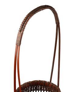 Ikebana basket in bamboo and rattan wickerwork coated with a clear lacquer