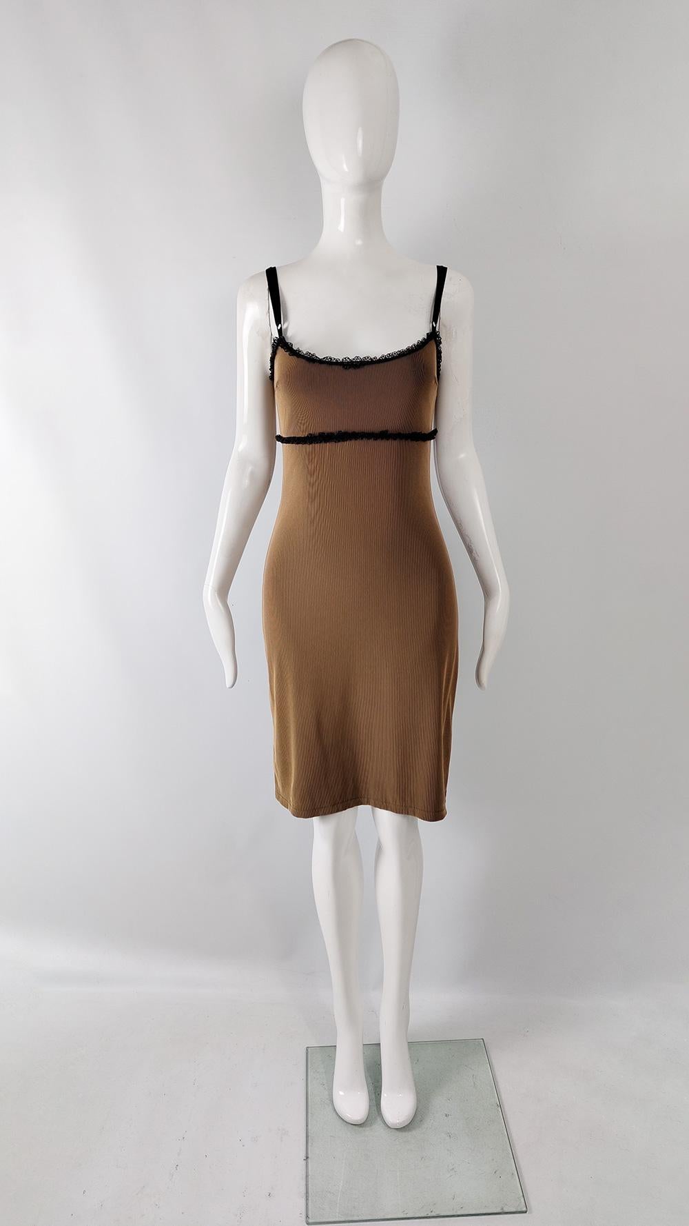 A sexy vintage womens dress from the late 90s by luxury fashion label Jiki of Monte Carlo for their Ikito line. Jiki was an expensive label founded by Jeanette I.K. Iverson, best known in the 80s and 90s for their sexy, high quality clothing which