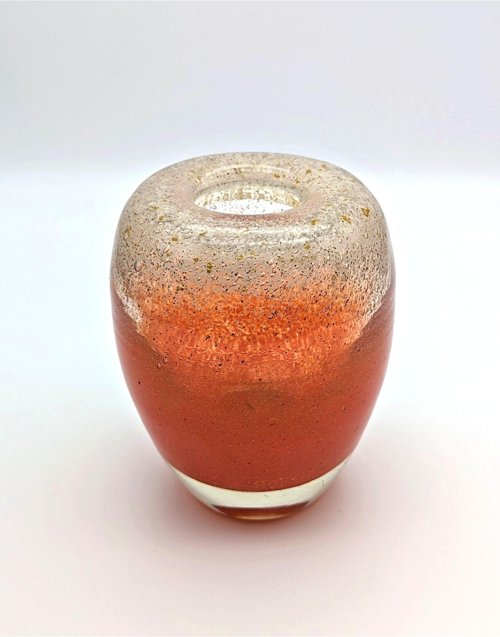 The ovoid shape of this vase was designed in the 1930ties by Walter Dexel, who was connected to artists form the Bauhaus in the 1920ties. The clear and elegant shape was then decorated by Karl WIedmann and his team in the former glass studio of the