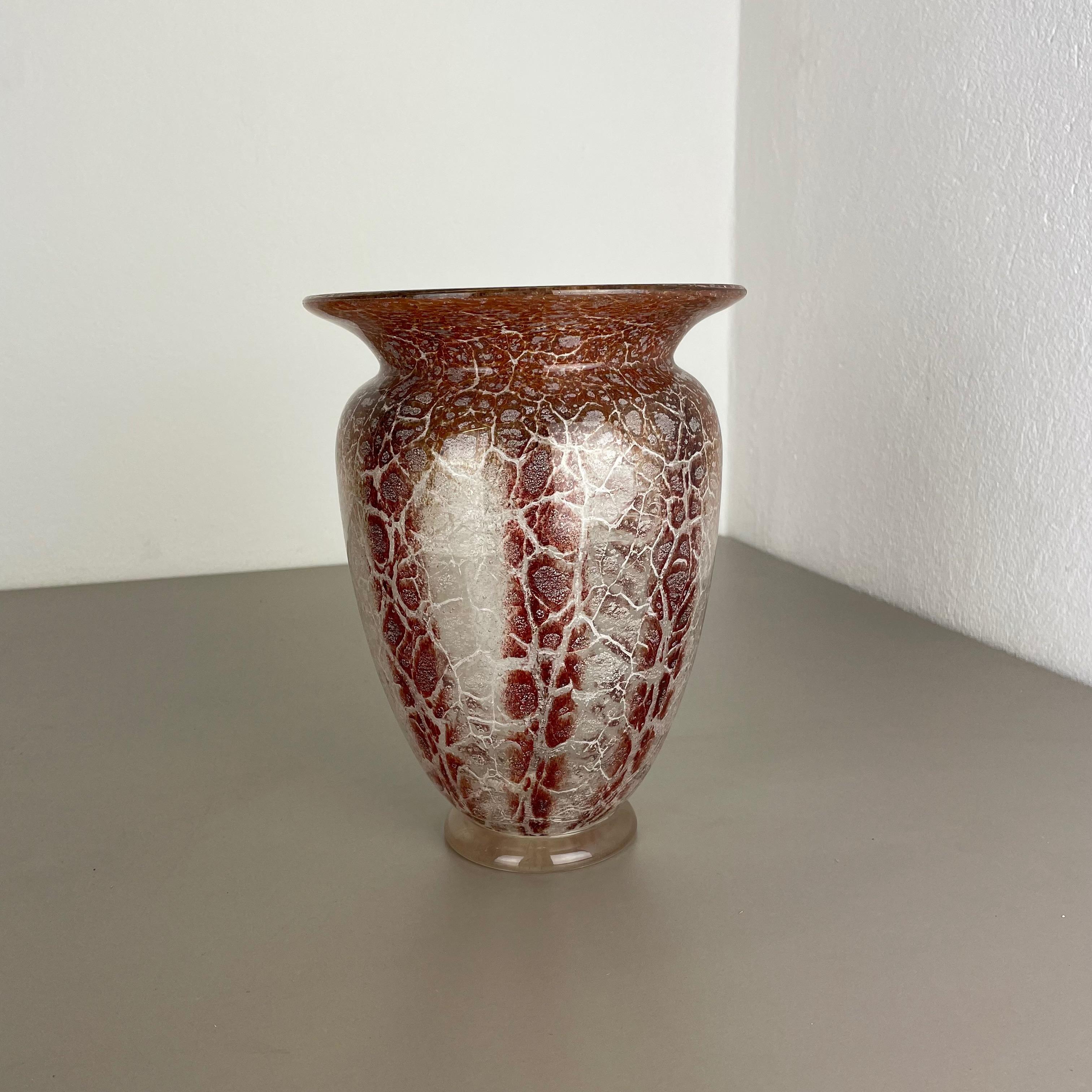 Article: Glass vase



Producer: WMF, Germany 



Designer: Karl Wiedmann 


Age: 1930s



Description: 

Wonderful heavy Art Deco glass element designed by Karl Wiedmann and produced WMF, Germany in the 1930s. This glass bowl is