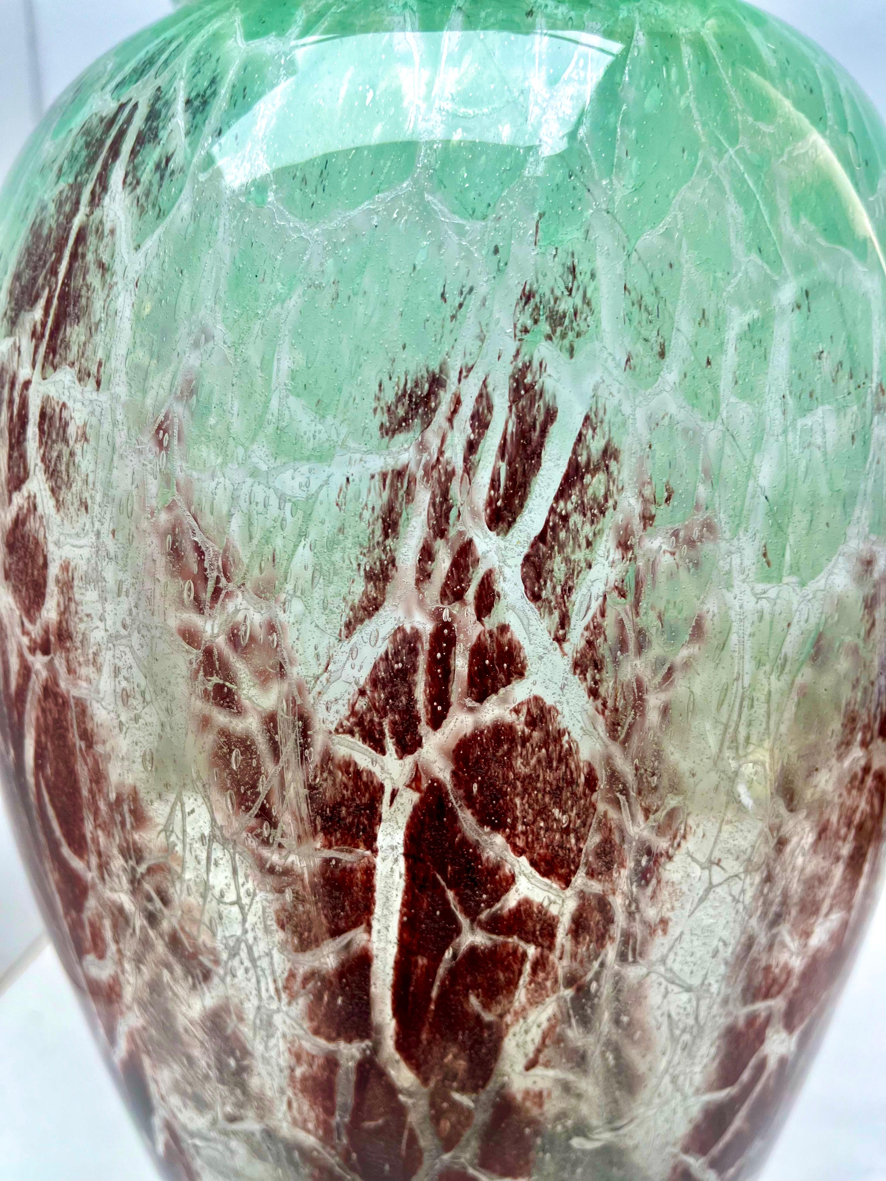 WMF 'Ikora' small crackled art glass vase
German glass bowl by Karl Wiedmann for WMF Ikora, 1930s Baushaus Art Deco.

A decorative 'Ikora' glass vase, produced, by WMF (Wurttembergische Metallwarenfabrik) in Germany.
With crackled details in