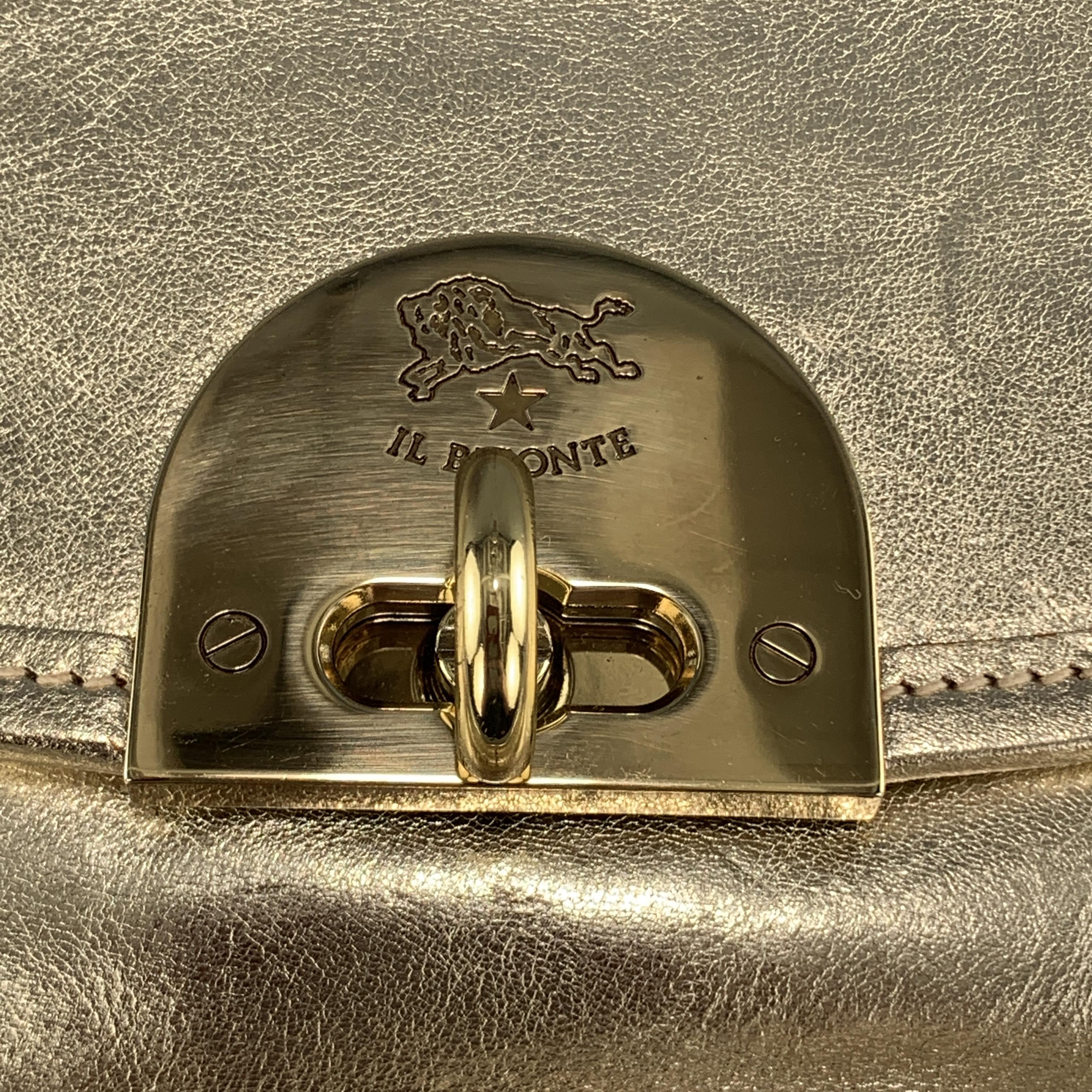 IL BISONTE mini bag comes in Platino champagne metallic gold leather with a flap turnlock closure. Wear it as a cross body or belt bag with different loops. Made in Italy.

New with Tags. 

Measurements:

Length: 6 in.
Width: 2.25 in.
Height: 5 in. 