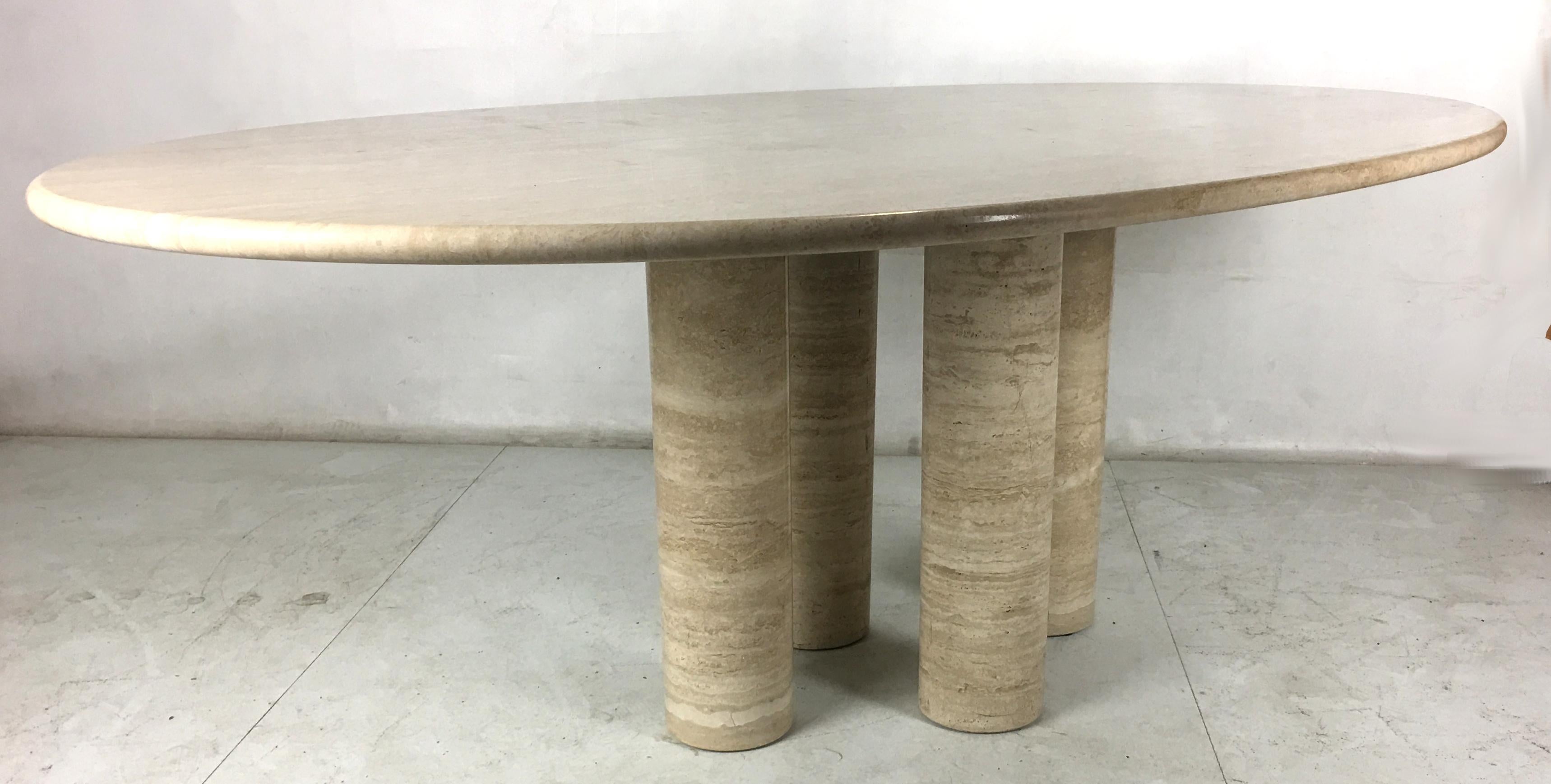 Stunning and rare II Colonnato dining table in solid Travertino Romano by Mario Bellini for Cassina, circa 1977. This rare table was only made for a few years, from 1977 through 1980. The 1.25