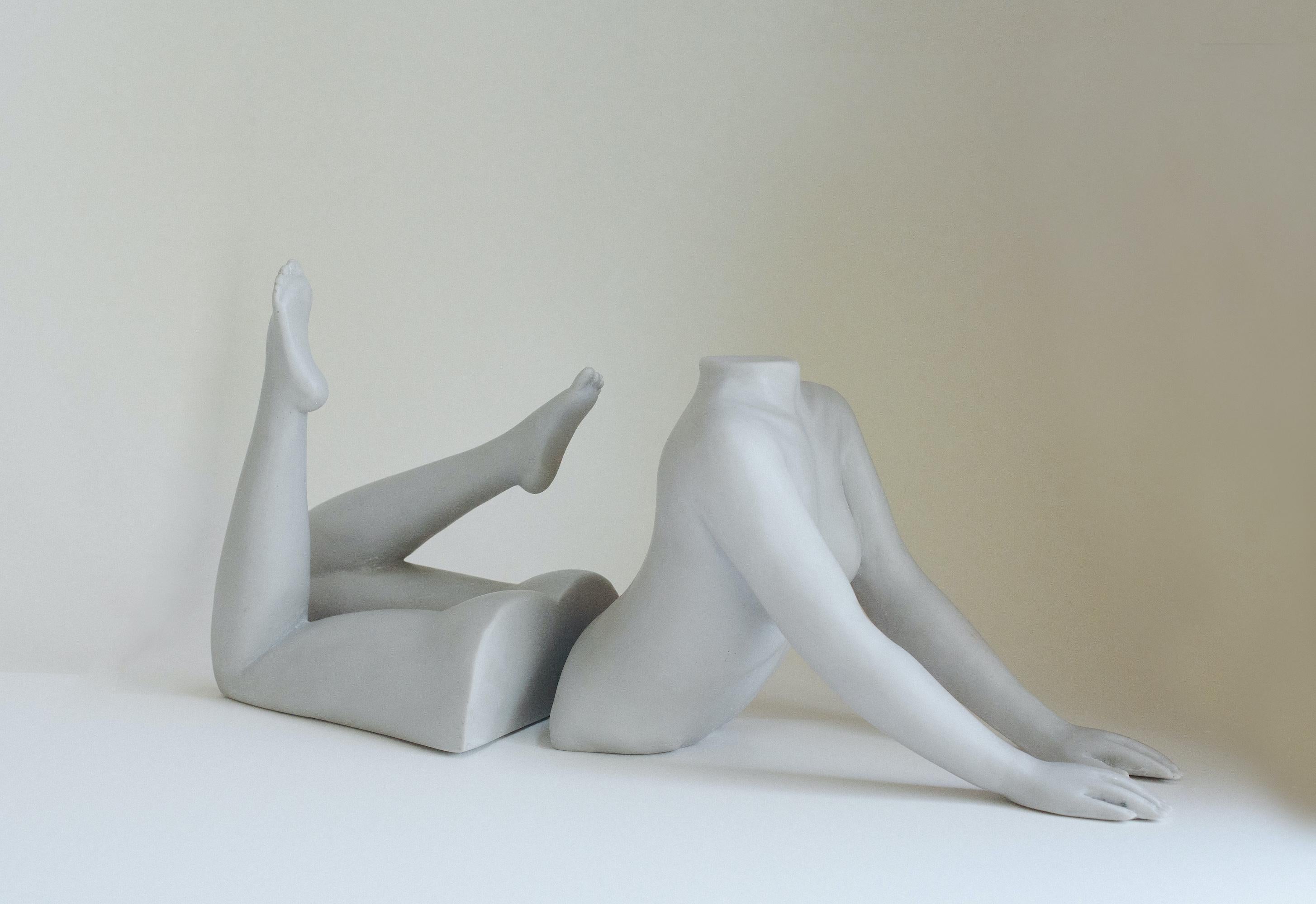 IL Corpo II bookends by Marcela Cure
Dimensions: upper W 31 x D 16 x H 24 cm / lower W 21 x D 18 x H 24 cm.
Materials: resin and stone composite.

Our Il Corpo sculpture is a set of two individual sculptures portraying the upper and lower body