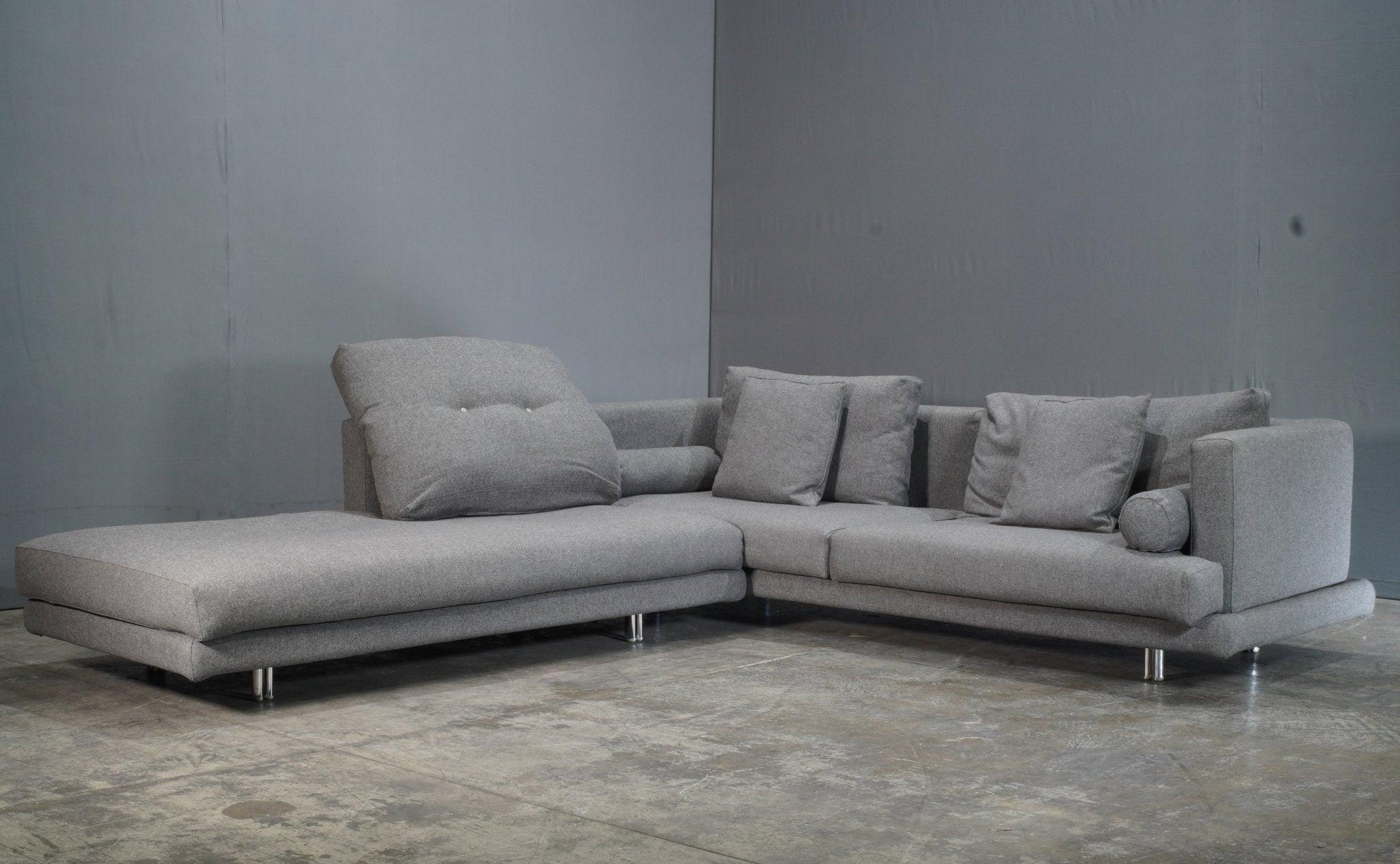 The Il Loft Mercury Line Modular Grey Sofa by Giorgio Saporiti is a striking blend of modern design and functional comfort. With its modular configuration, this sofa offers flexibility in creating the perfect seating arrangement for any space.