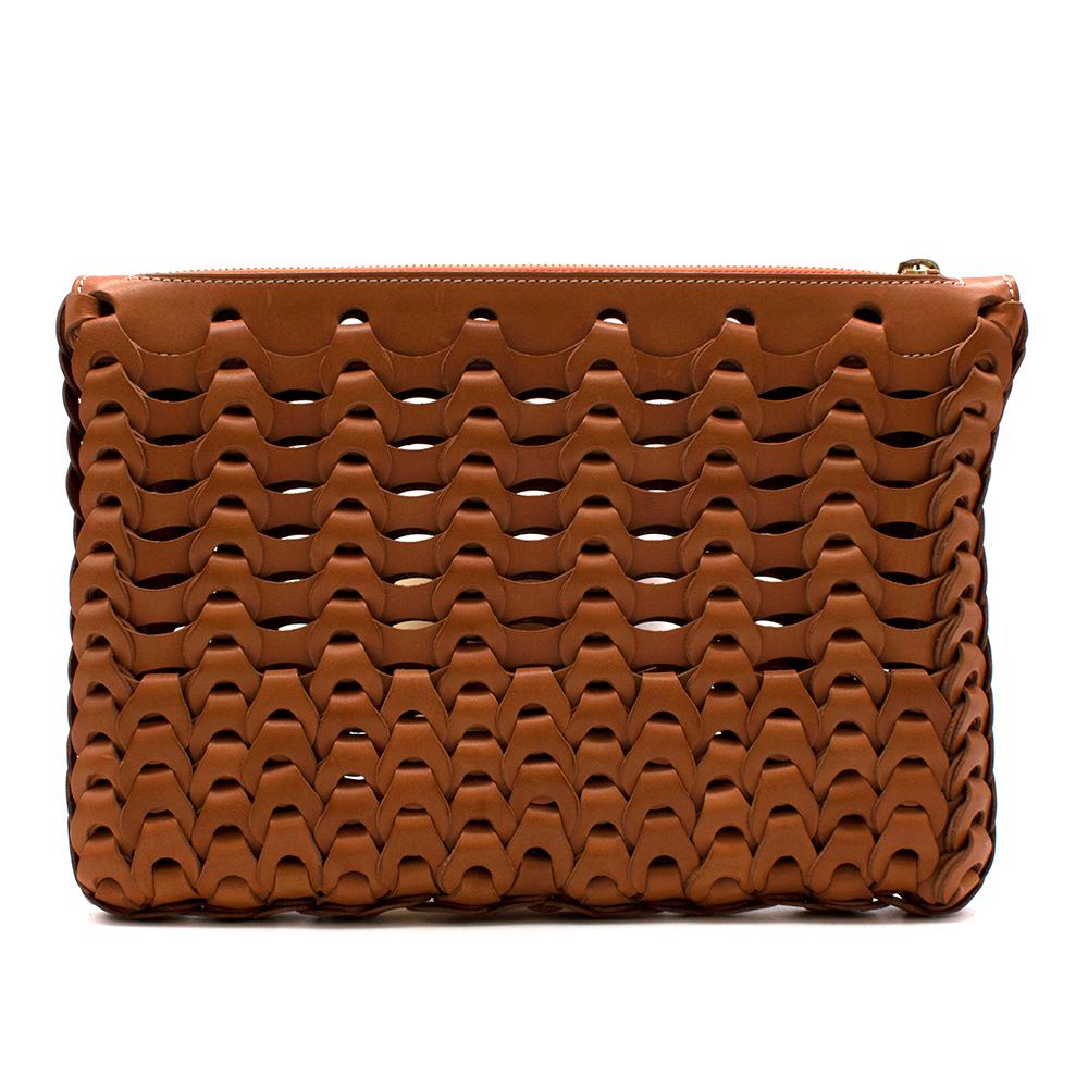 Il Micio Hidetaka Fukaya Brown Leather Woven Clutch Bag

-Beautiful woven style
-Genuine leather material
-Gold zip enclosure with orange fabric detailing
-Clutch hand strap on front
-Original box and dust bag included

Materials: Leather

Made in