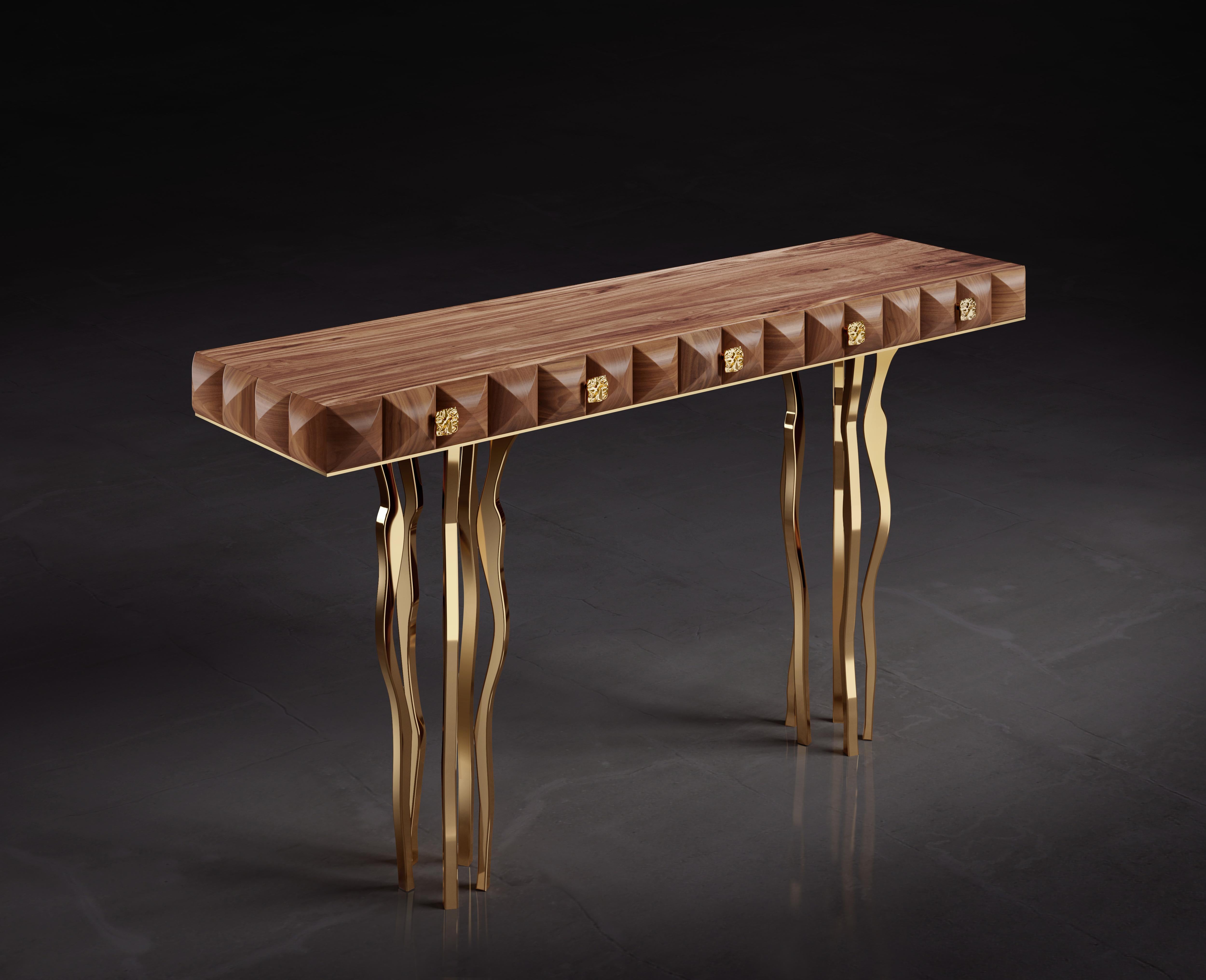 Mesa consola Il Pezzo 10 by Il Pezzo Mancante
Dimensiones:  An 165 x Pr 45 x Al 89 cm
Materiales: Estructura: 100% nogal macizo tratado con aceite natural
Base:  latón satinado / bronce / oro / níquel
Peso: aprox. 50 Kg
2 cajones


Il Pezzo Mancante