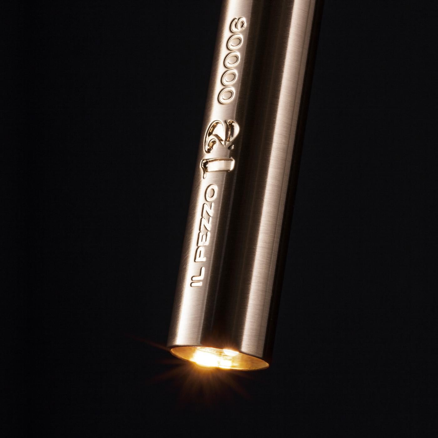 Refined and seductive, Il Pezzo 12 Staggered Chandelier evokes the image of female figures carrying light within. Tapered brass stems house precious crystal diffusers with integrated LED sources, while an additional LED at the tip provides direct