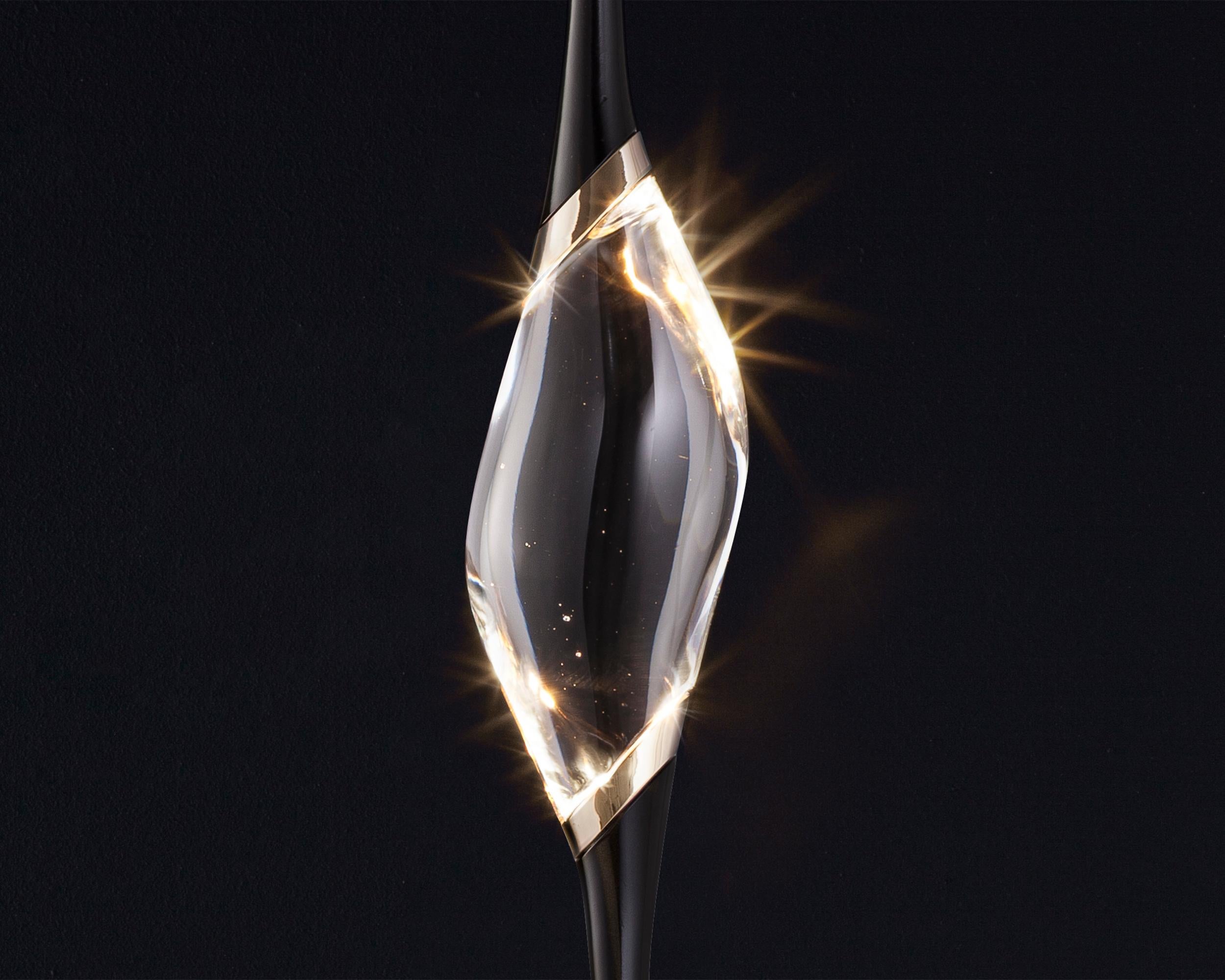 Il Pezzo 12 is a female figure suspended in the air, carrying in her womb the light. It’s nimble, refined, addictive.
The solid clearest crystal, brilliantly illuminated by two LEDs, diffuses ambient light and casts mesmerizing patterns throughout