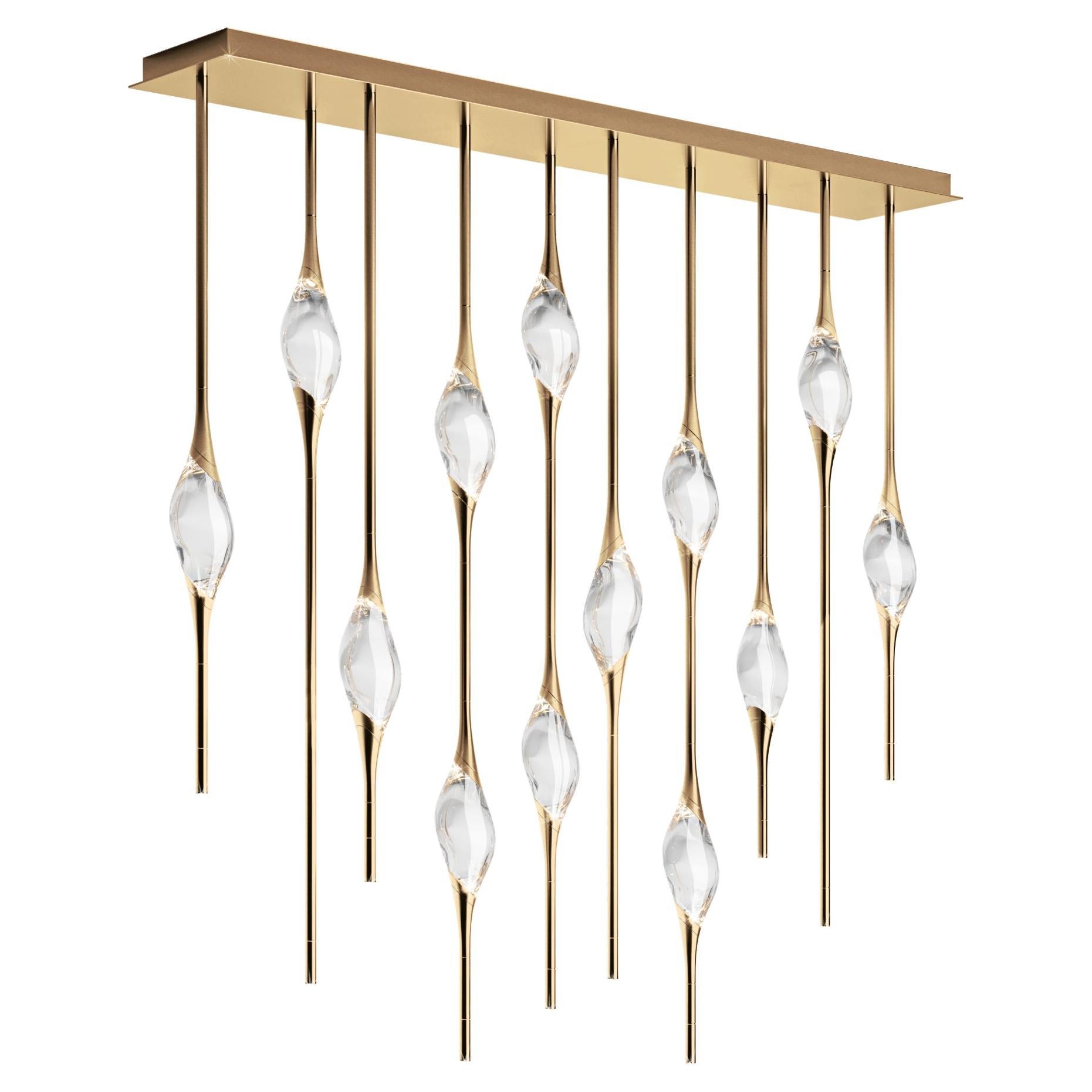 "Il Pezzo 12 Staggered Chandelier" - length 150cm/59” - polished brass - crystal