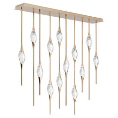 "Il Pezzo 12 Staggered Chandelier" - length 150cm/59” - satin brass - crystal