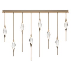 "Il Pezzo 12 Staggered Chandelier" - length 160cm/63” - satin brass - crystal
