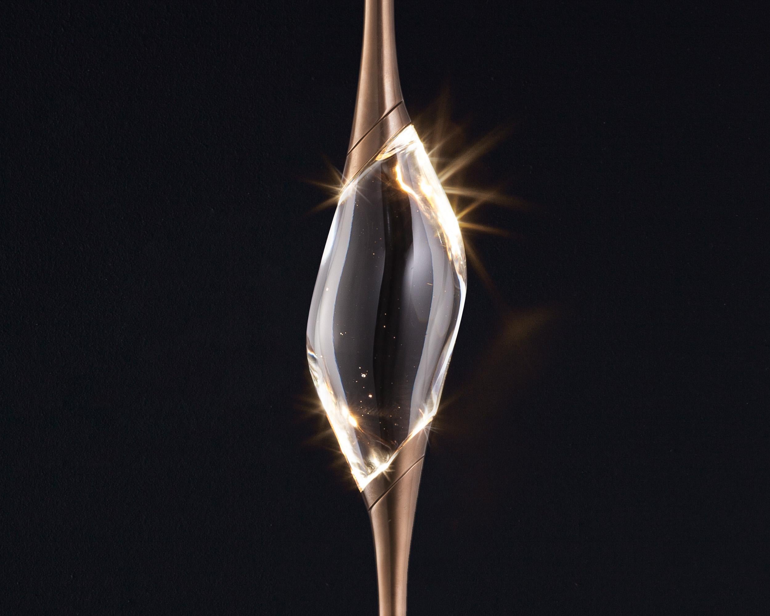 Il Pezzo 12 is a female figure suspended in the air, carrying in her womb the light. It’s nimble, refined, addictive.
The solid clearest crystal, brilliantly illuminated by two LEDs, diffuses ambient light and casts mesmerizing patterns throughout