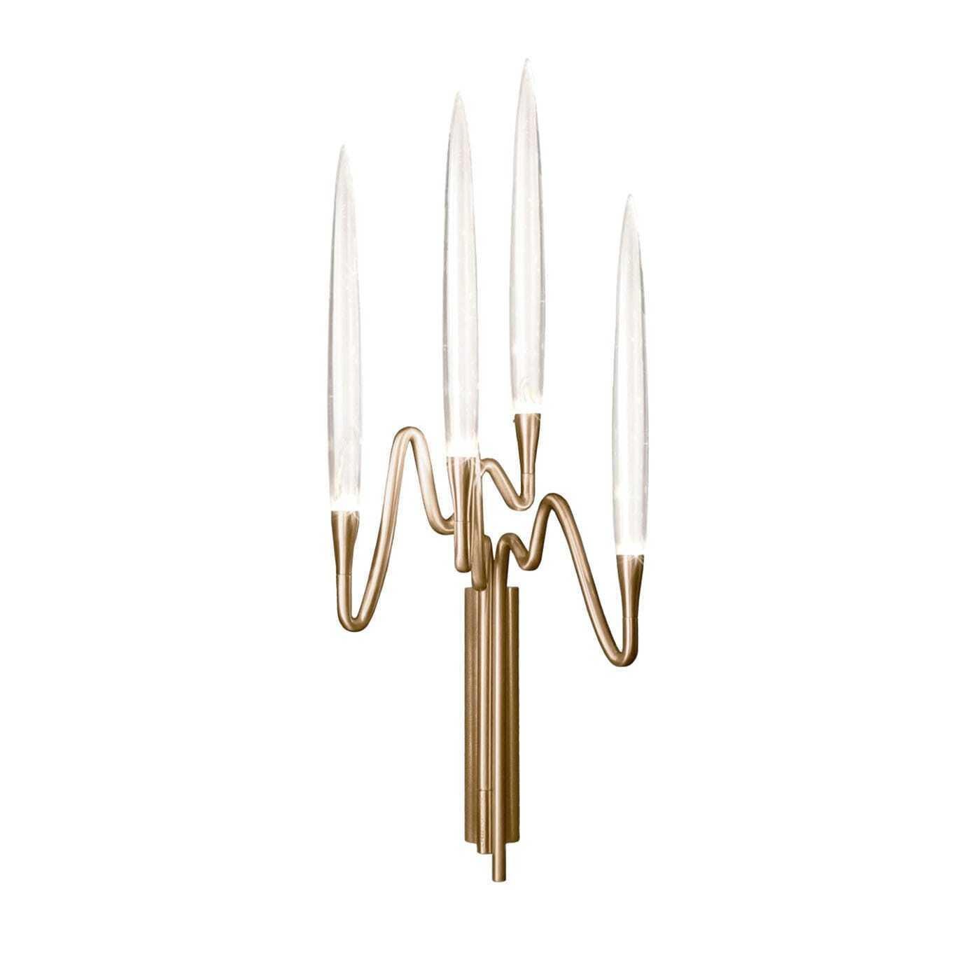 Il Pezzo 3 Wall Sconce, designed by Cosimo Terzani and Barbara Bertocci, draws inspiration from Arabic calligraphy and classic candelabra design. Featuring a satin brass finish, hand-forged brass, and solid crystal “candles”, it utilizes dimmable