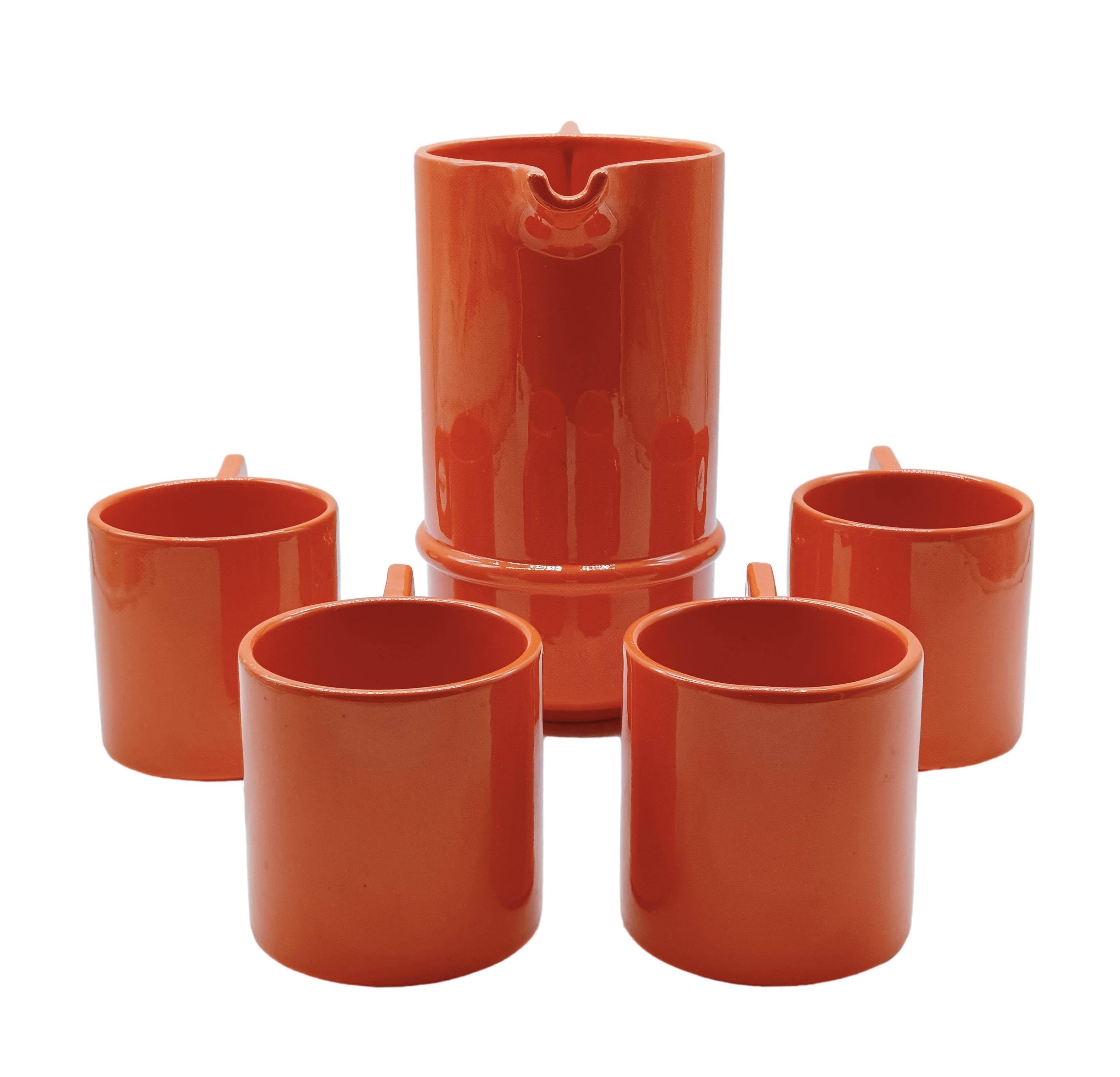 Gorgeous set of four orange mugs with Il Picchio ceramic pitcher, ( signature under base)