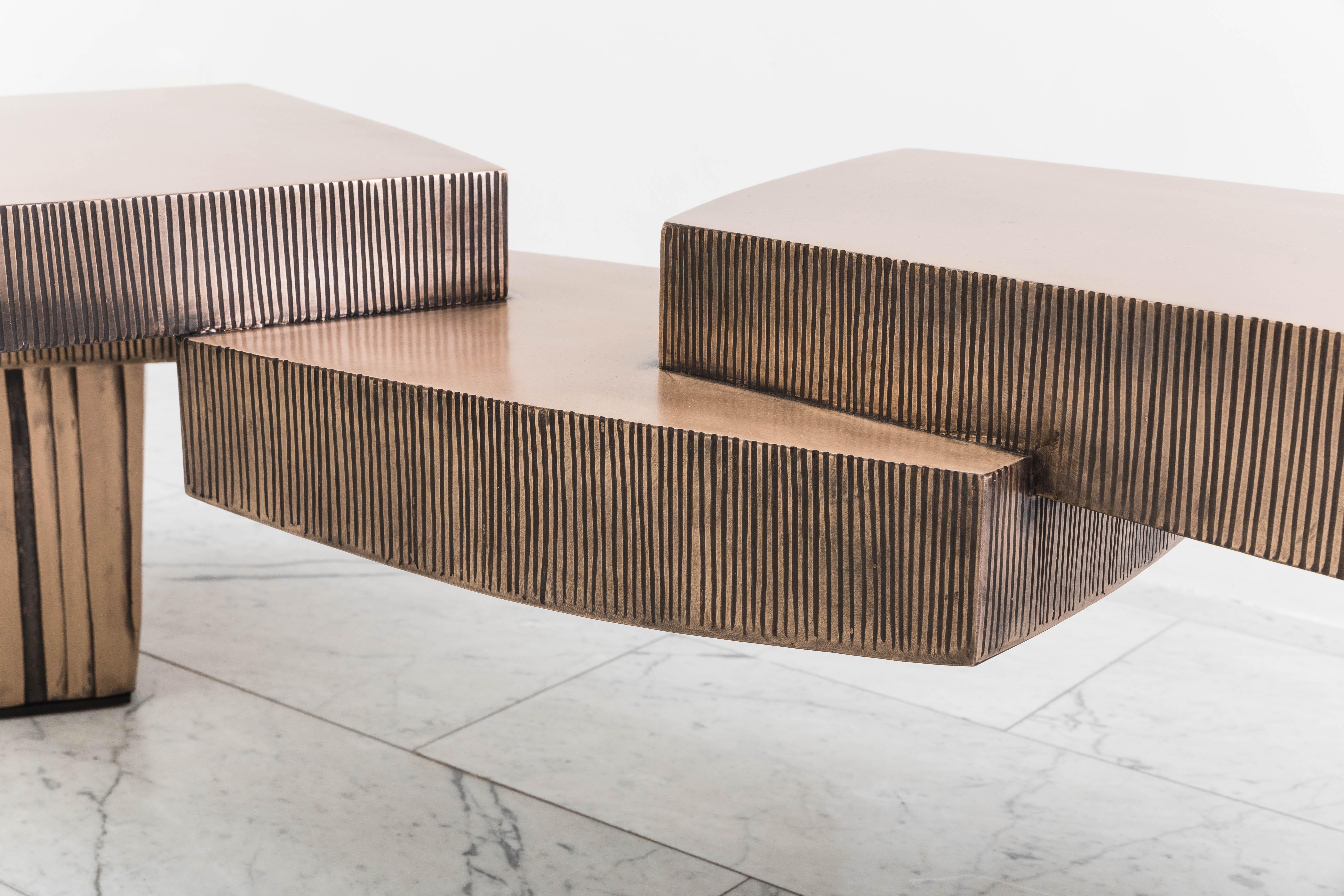 The II Ponte Bench (The Bridge) was inspired by Constructivism and Frank Lloyd Wright’s cantilevered homes, Gary Magakis channels architectural elements in his work. Though the table’s geometric sections appear to have sharp edges, they are actually