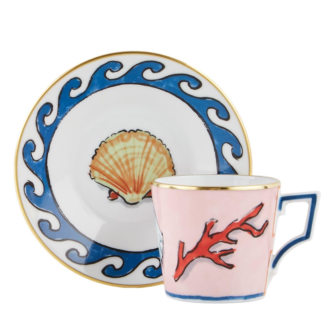 This sophisticated set of two coffee cups with their saucers is a celebration of classical aesthetic and ancient mythology, seen through the eyes of designer Luke Edward Hall. The delicate depiction of a shell and a coral branch are interpreted with