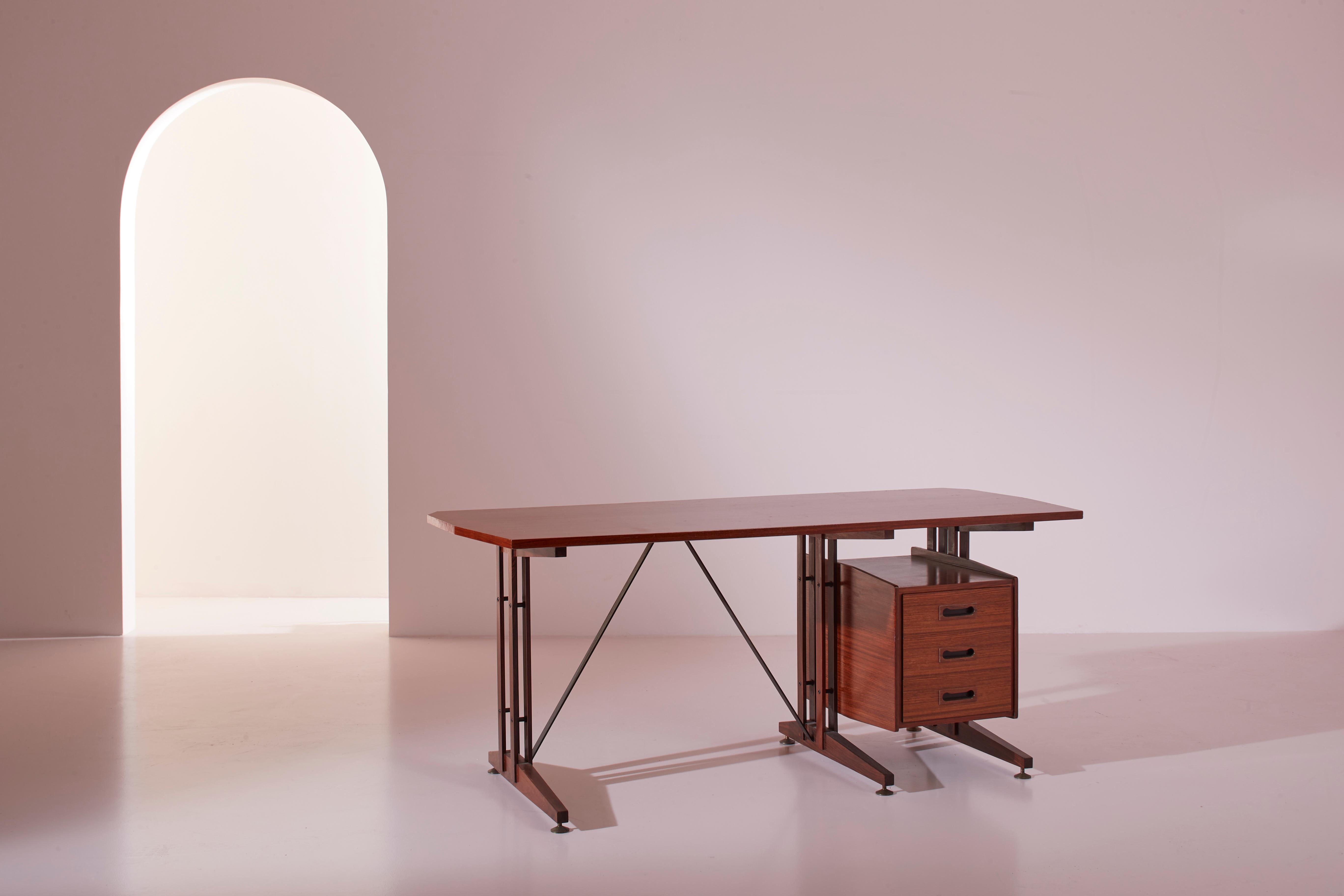 A beautiful Italian desk made of teak and metal, produced by ILA (Industria Lombarda Arredi), model 