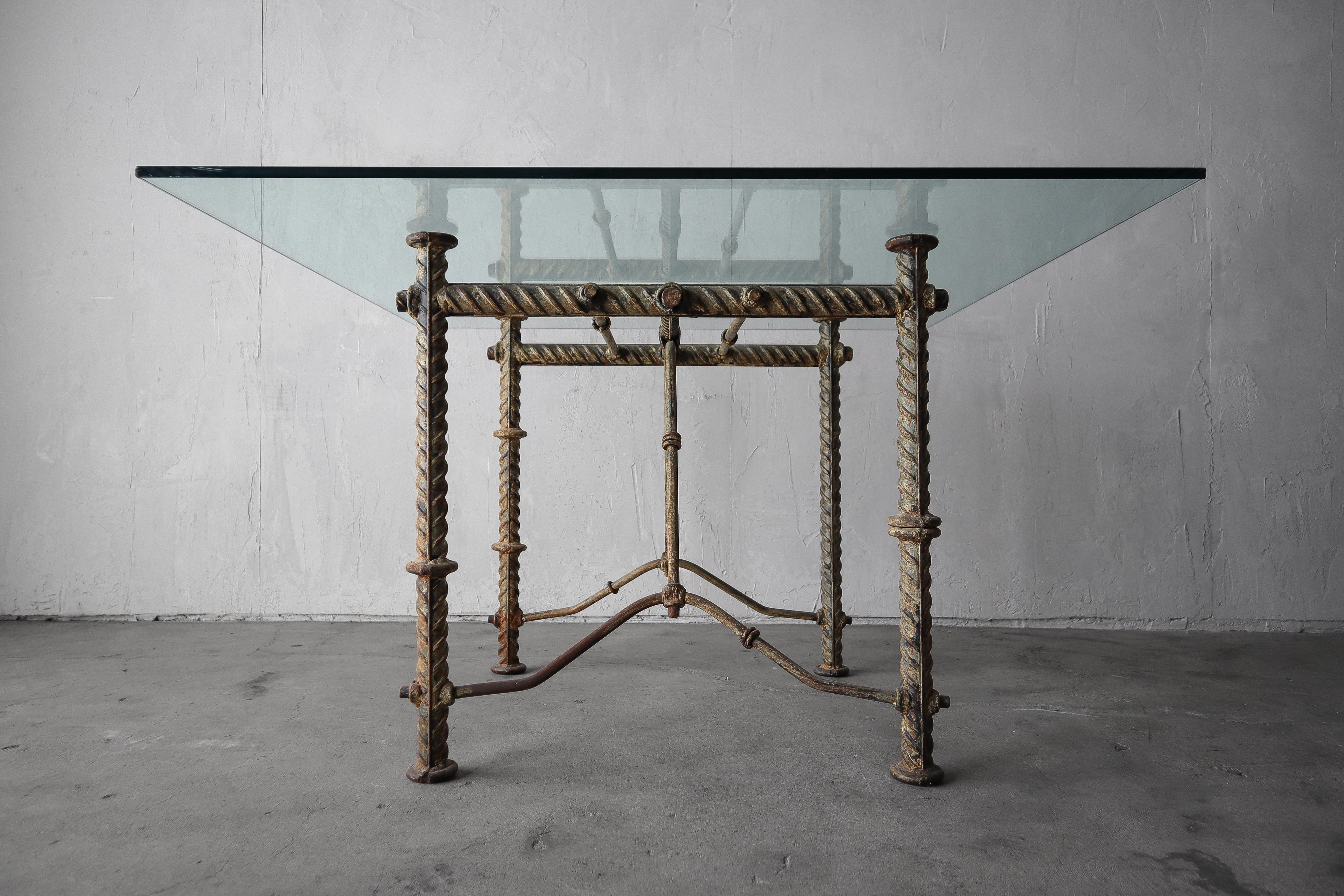 Substantial wrought iron table base by Ilana Goor. This piece is substantial, and unique, the base easily weighs 75+lbs.  The table is brutalist style with oversized rebar construction, customary to Goor pieces, please refer to detail