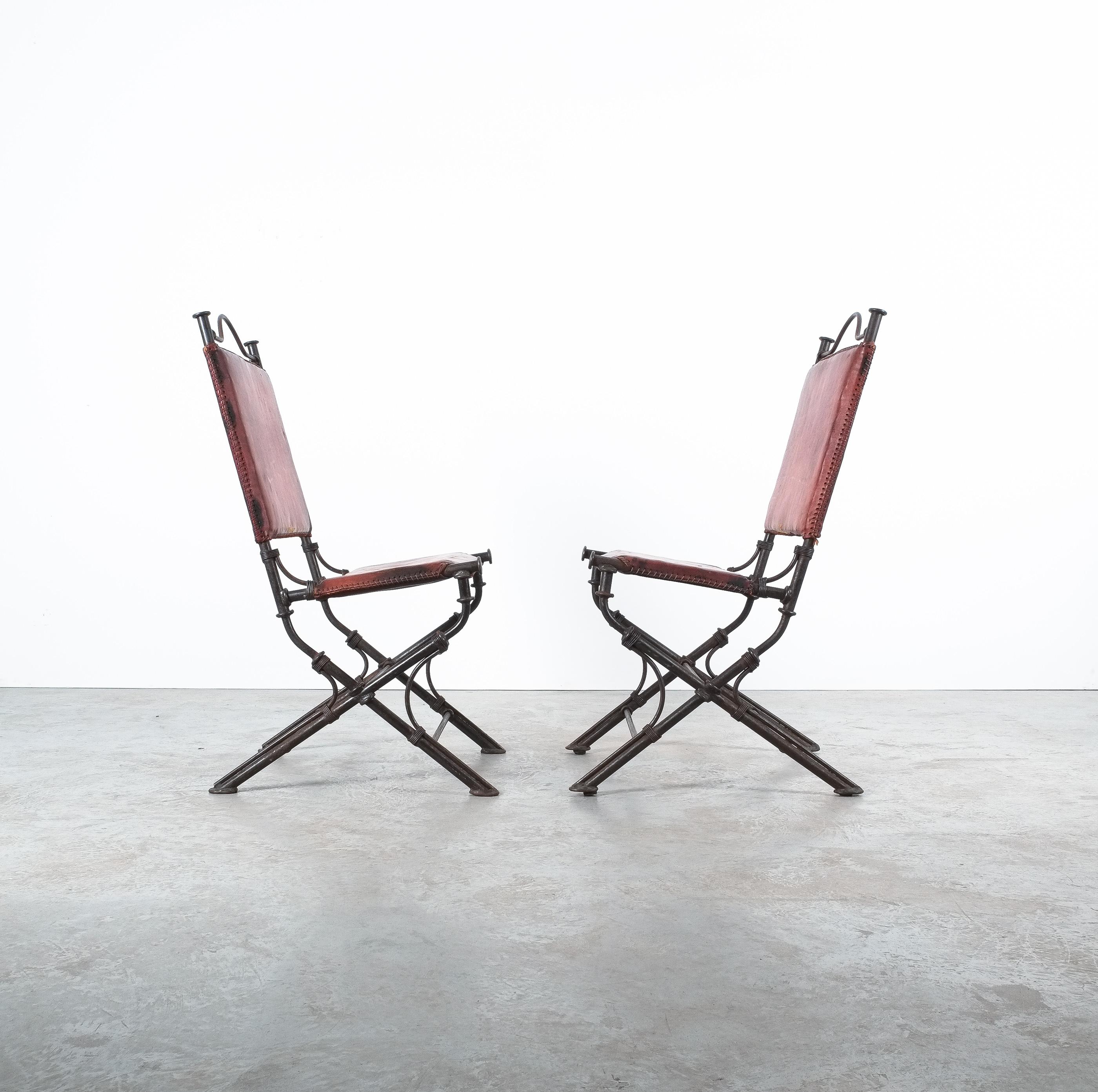 Ilana Goor style wrought iron leather garden chairs.
Only one piece is left.

Nice single leather chair in a 19th garden folding chair manner. It's in fact a sturdy heavy 12,5kg chair, carefully manufactured with great love for detail. Great quality