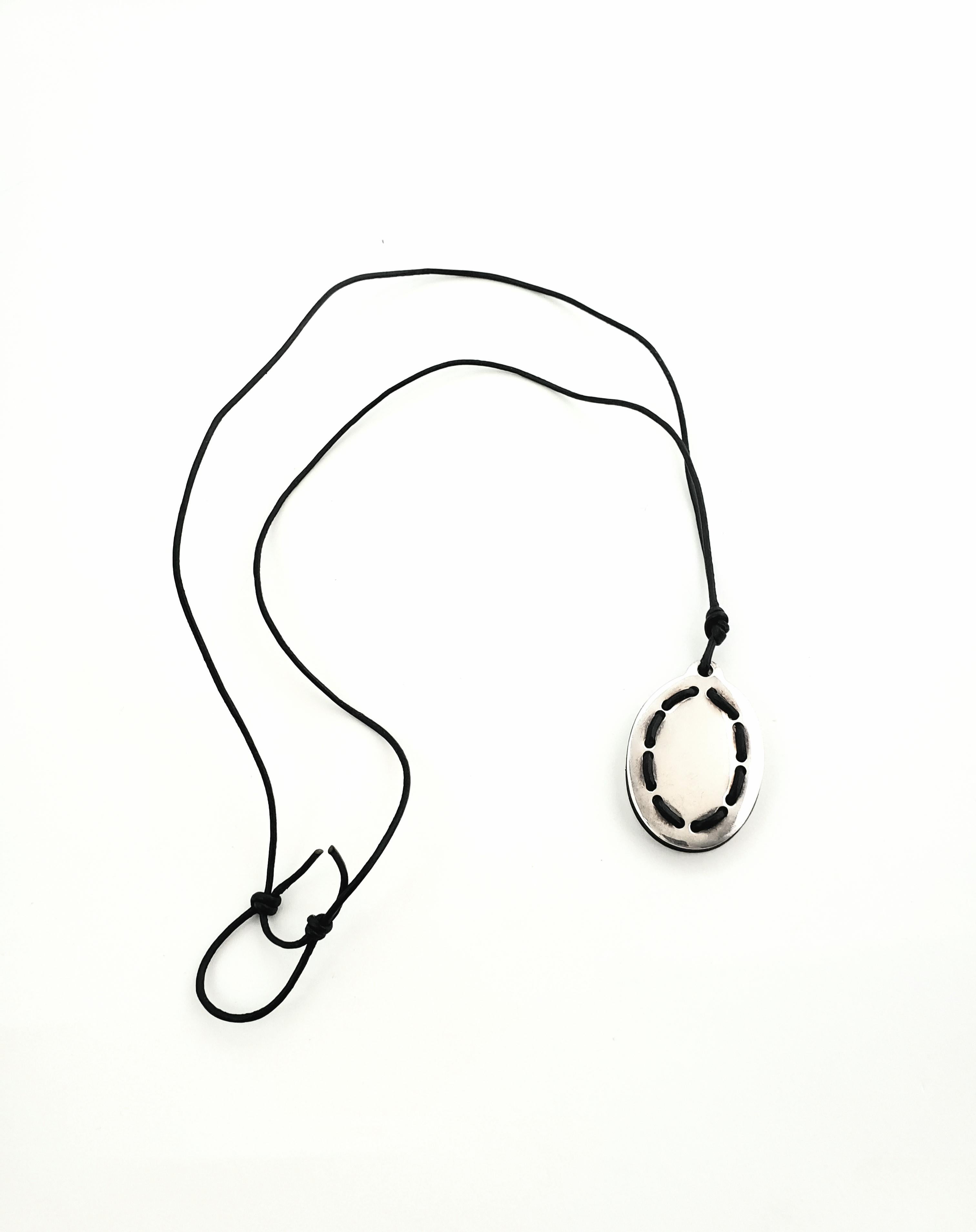 Ilario Casi Italy Sterling Silver Pendant with Black Cord Necklace

This is a lovely sterling silver pendant with a black cord necklace by Ilario Casi.

Measurements:     Black Cord Necklace measures approx 29 inches.  Pendant measures 1 and 3/4