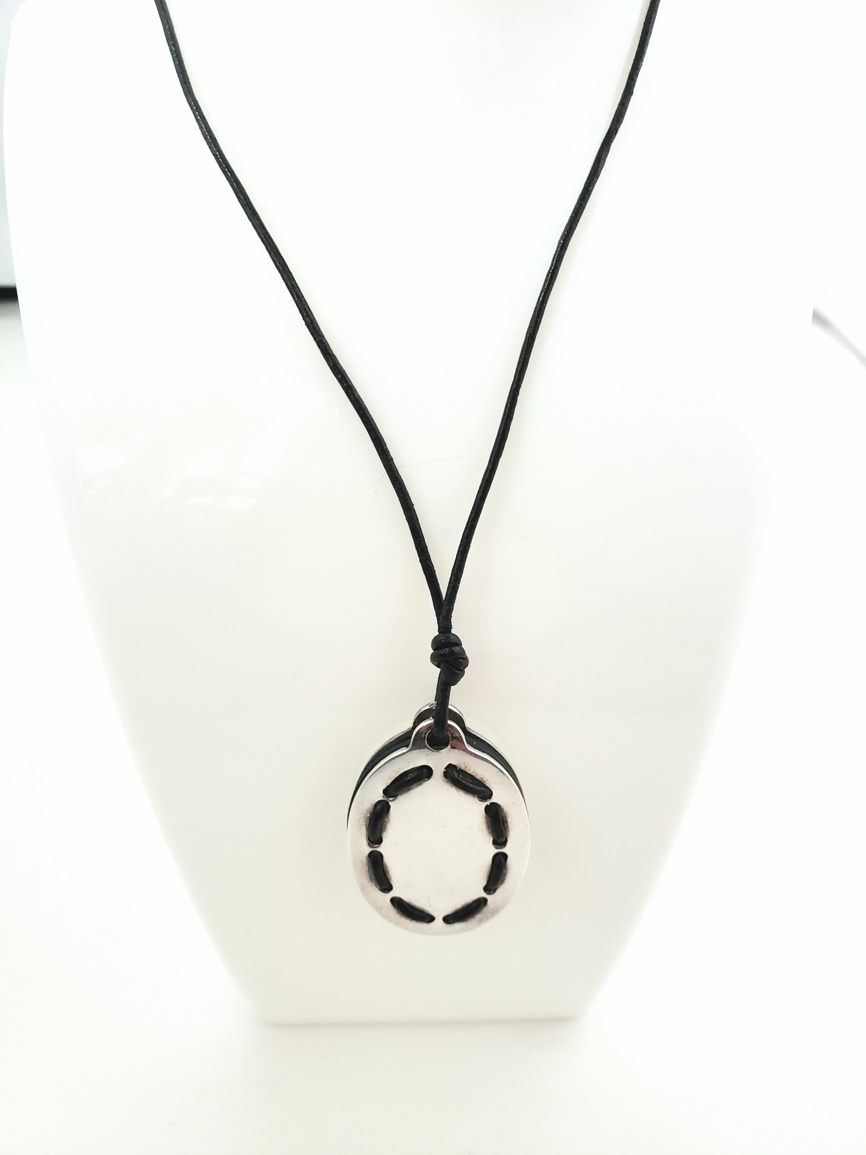 black cord necklace with pendant