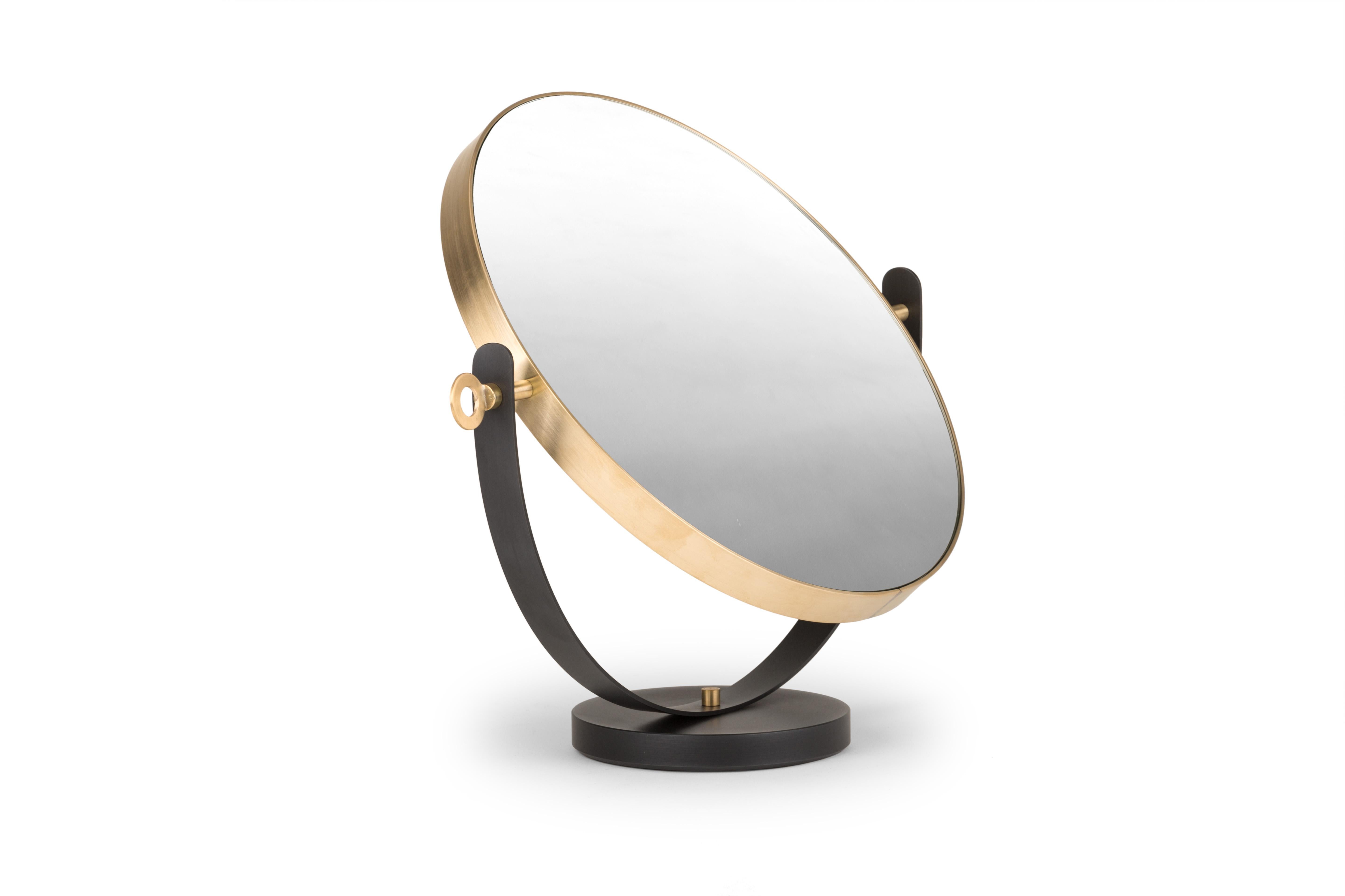 Ilario mirror by Mingardo
Dimensions: D 47 x W 18.5 x H 47 cm.
Materials: iron and natural brass, mirror.
Weight: 7 kg

Also available in different finishes. 

The name of the mirror describes its essence: Ilario was the founder of the