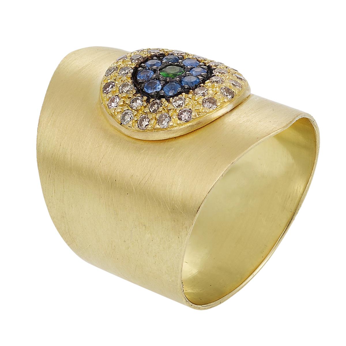This satin-finished 18k yellow gold wide shield ring is embellished at the face with a pavé gemstone 