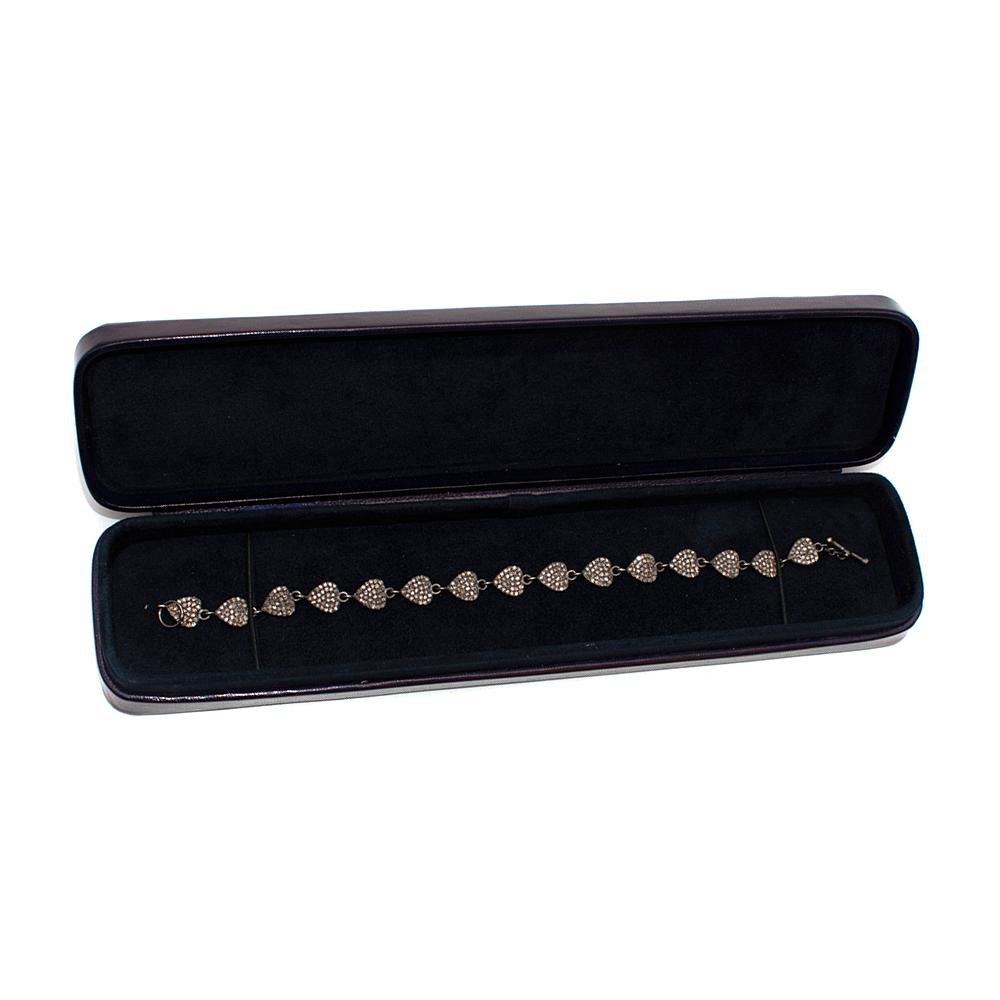 Ileana Makri Love Chain bracelet 

- Small hearts with Grey diamonds
- Oxidised Silver 
- T-bar closure
- Slim design

Length 20.5cm
Width 0.7cm