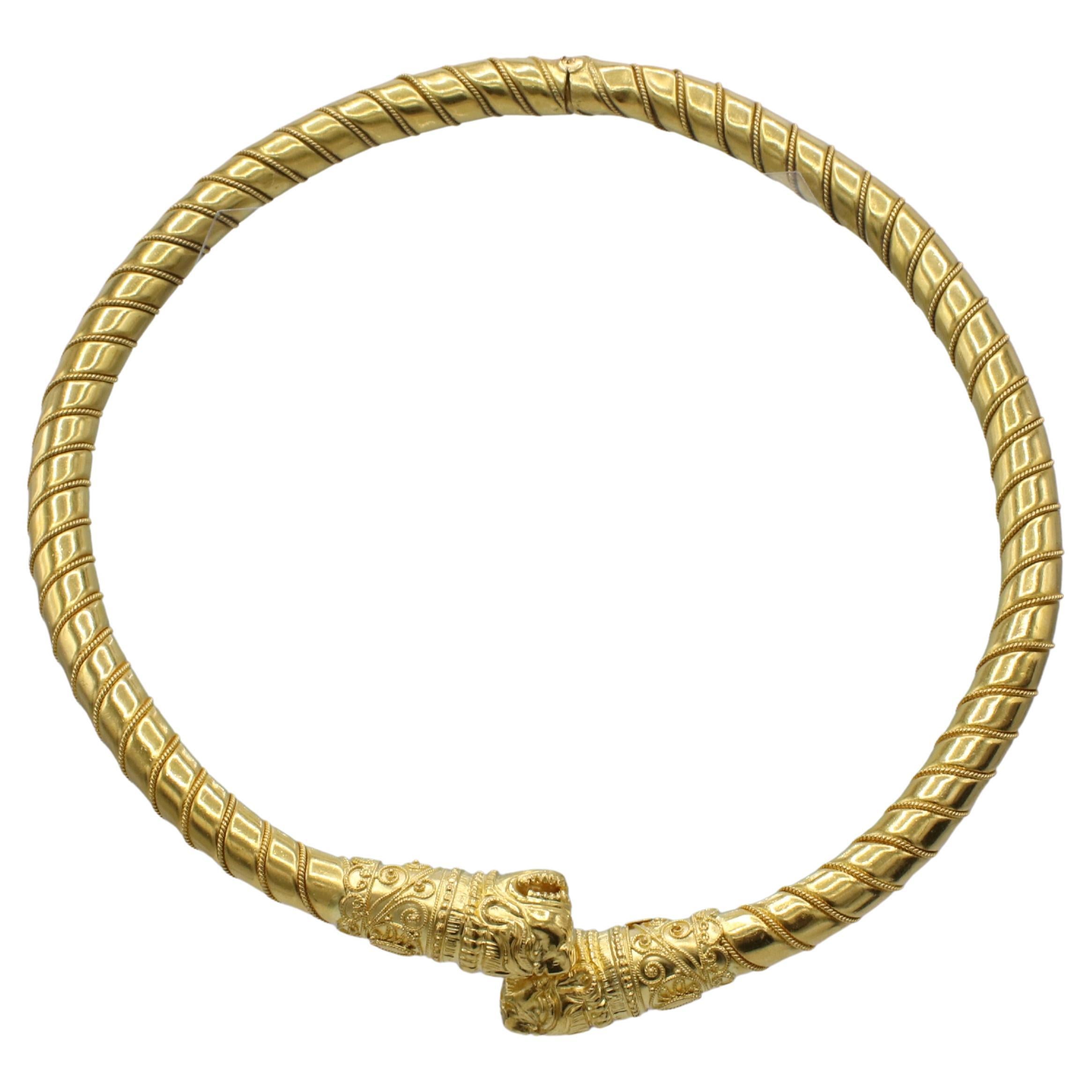 Ilias Lalaounis 18 Karat Yellow Gold Double Lion Animal Head Collar Necklace 
Metal: 18k yellow gold
Weight: 71.6 grams
Width: 8-13mm
Circumference: Approx. 16 inches
Diameter: 5 inches
LDDD F35000194