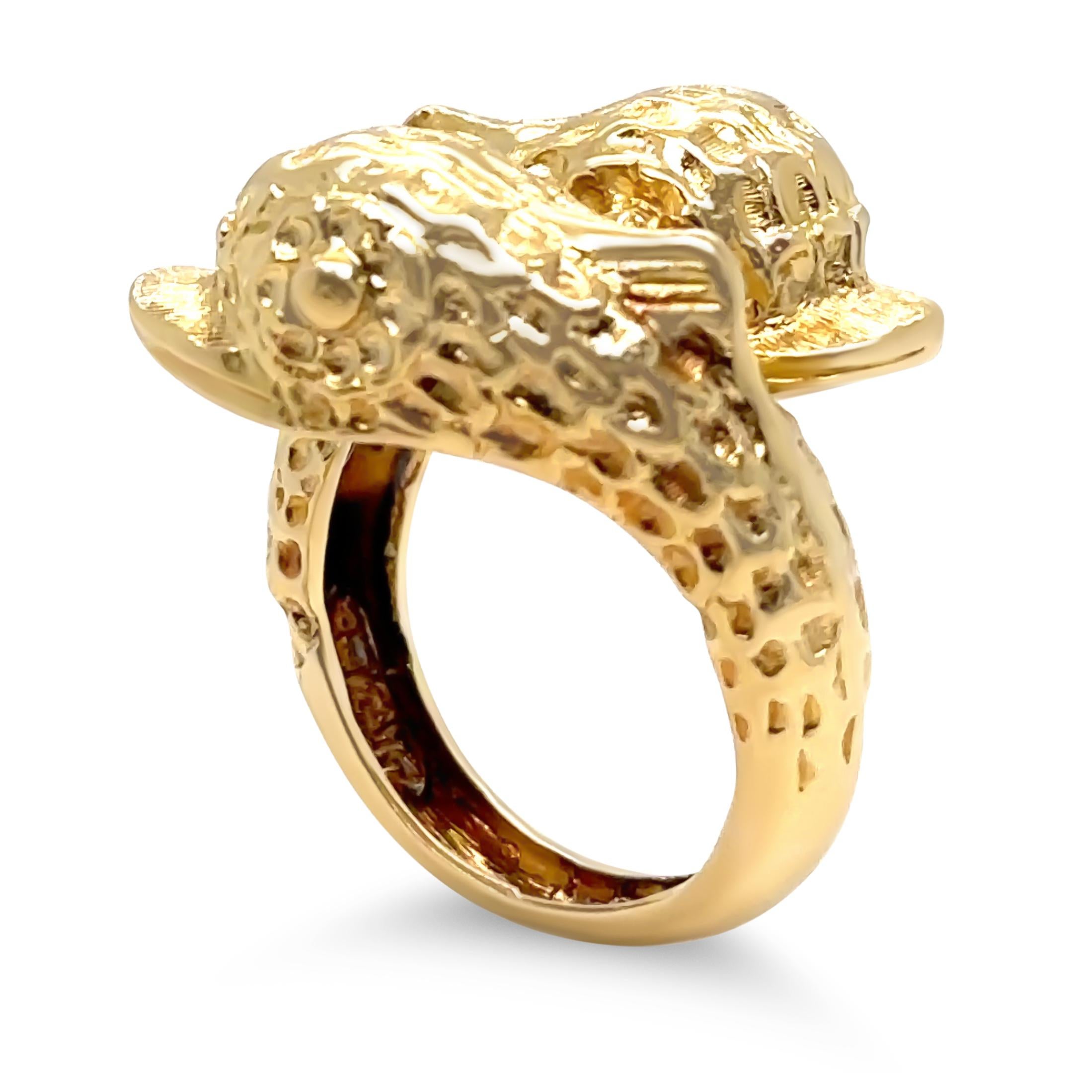 This distinctive Ilias Lalaounis ring is masterfully crafted in 18ct yellow gold, showcasing the brand’s signature textured finish and bold sculptural design. Known for drawing inspiration from ancient Greek art and culture, Lalaounis pieces are