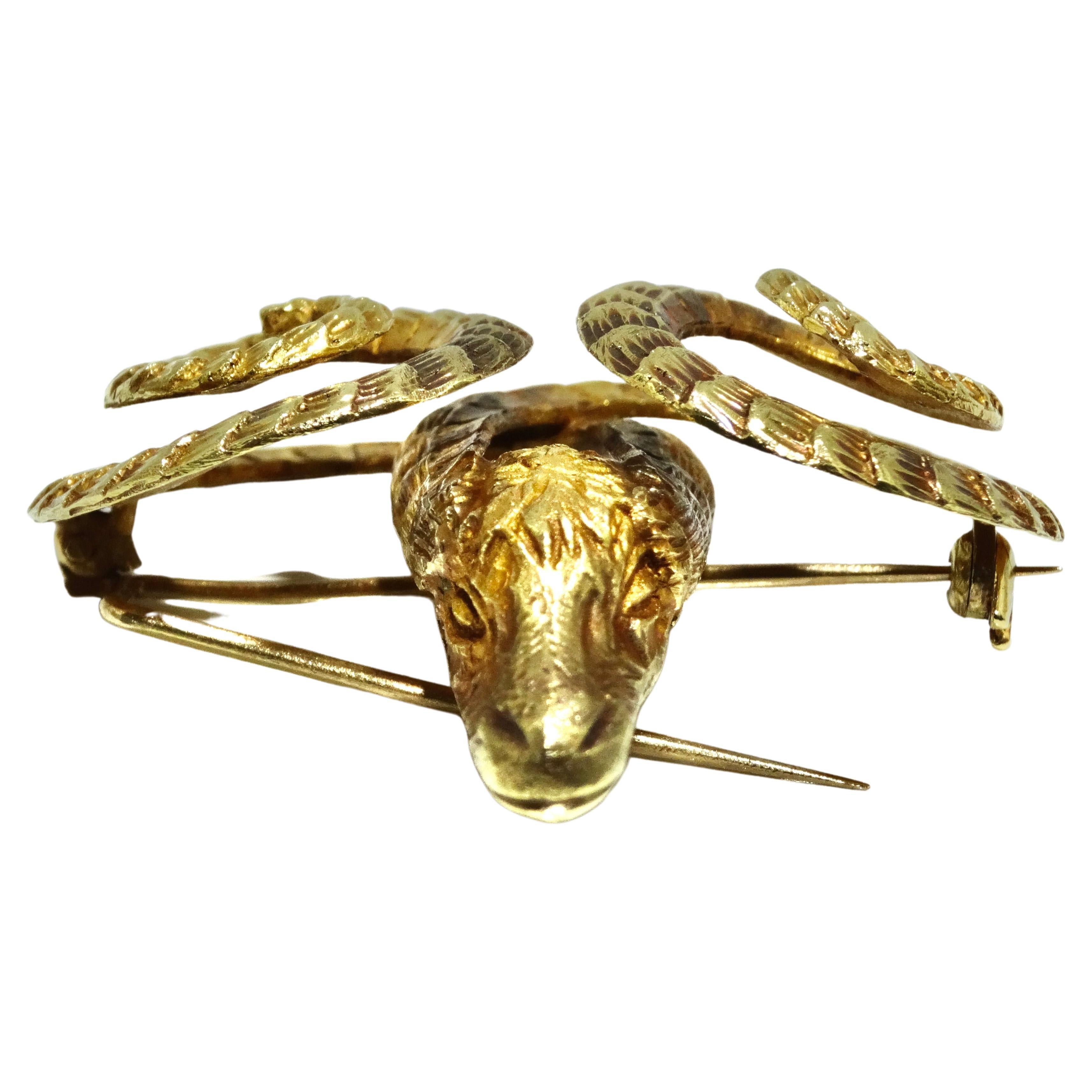 Ilias Lalaounis 18k gold ram's head brooch circa 1980s, Finely detailed with gold chasing and texturing 18k gold. Style beautiful with your Dior or Chanel Jacket or Blazer. 
Note: Double pinstem, one catch. 

Size 2 x 1-3/4 inches
Weight 31.46 grams