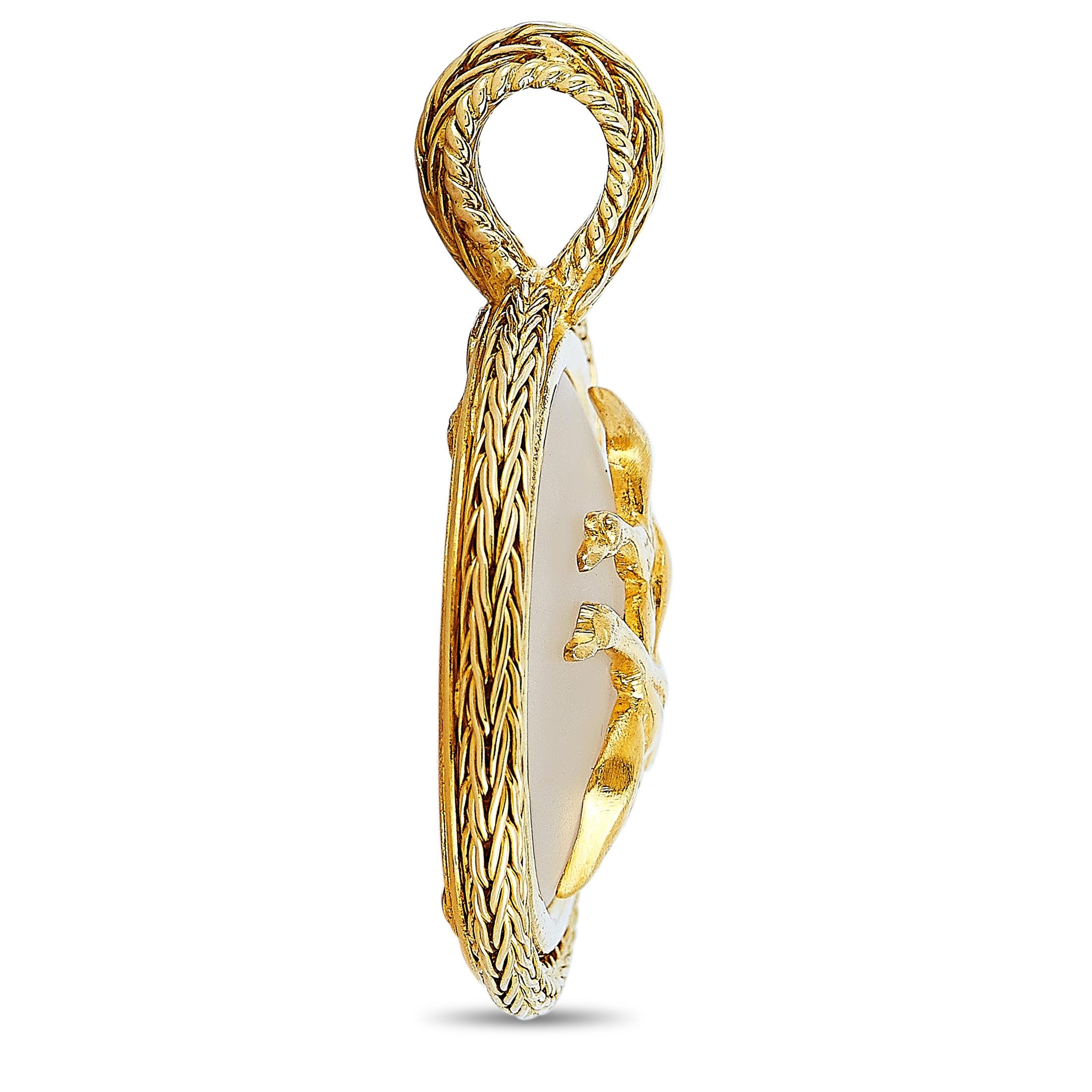 This Ilias Lalaounis pendant with flying geese motif is made out of 18K yellow gold and crystal and weighs 25.4 grams. It measures 1.75” in length and 1.70” in width.