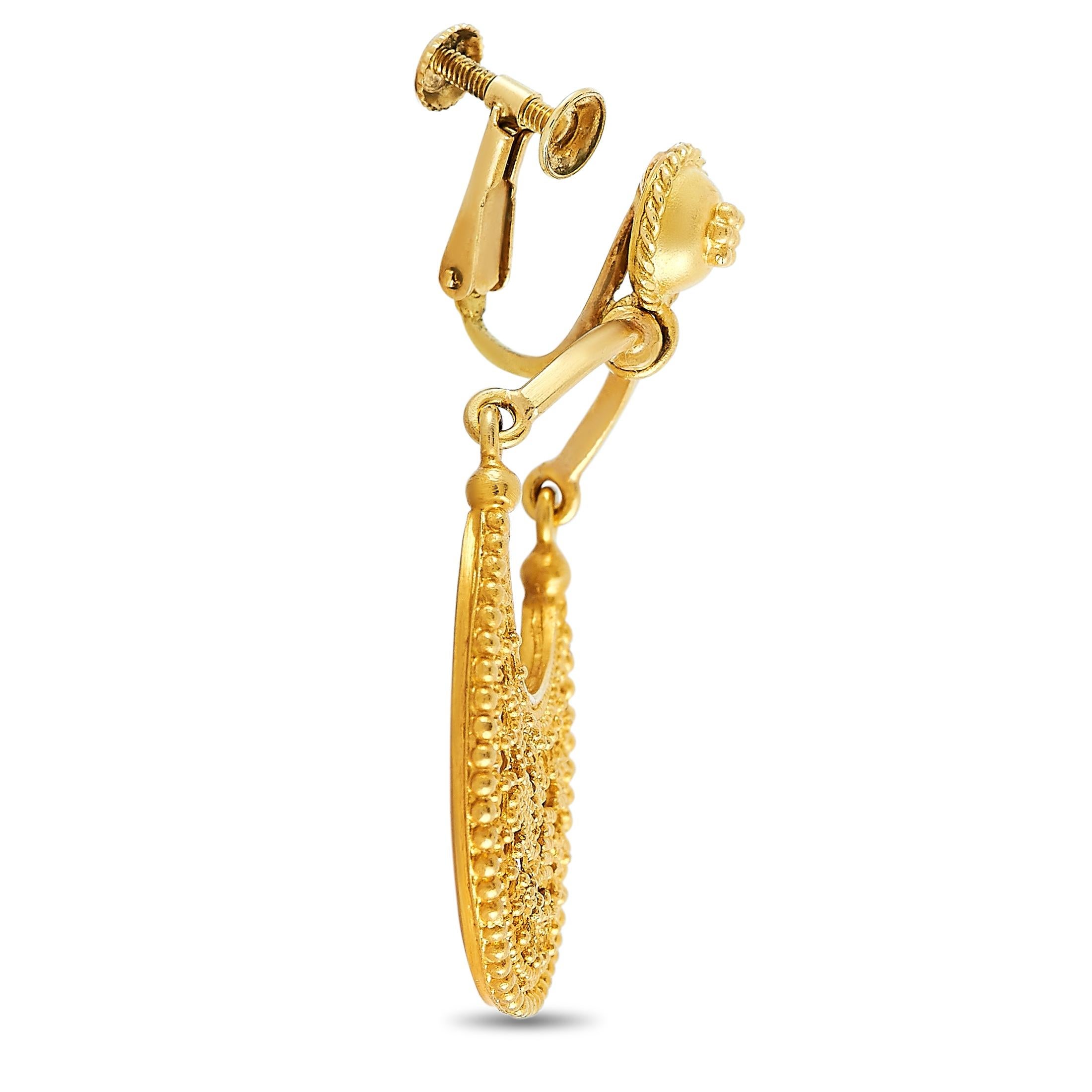 These Ilias Lalaounis earrings are made of 18K yellow gold and each of the two weighs 6.7 grams. They measure 1.62” in length and 1” in width.
 
 The pair is offered in estate condition and includes a gift box.
