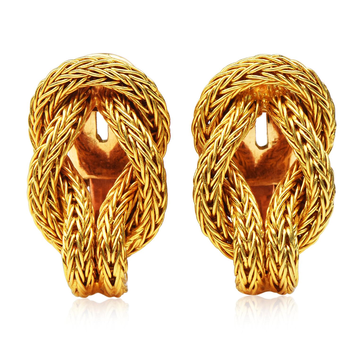 From the recognized designer Ilias Lalaounis.

Crafted in solid 18K Yellow Gold, these exquisite Hercules Knot motifs symbolize the strength and durability of love. 

the earrings have been finished with clip backs so they can be worn by those with