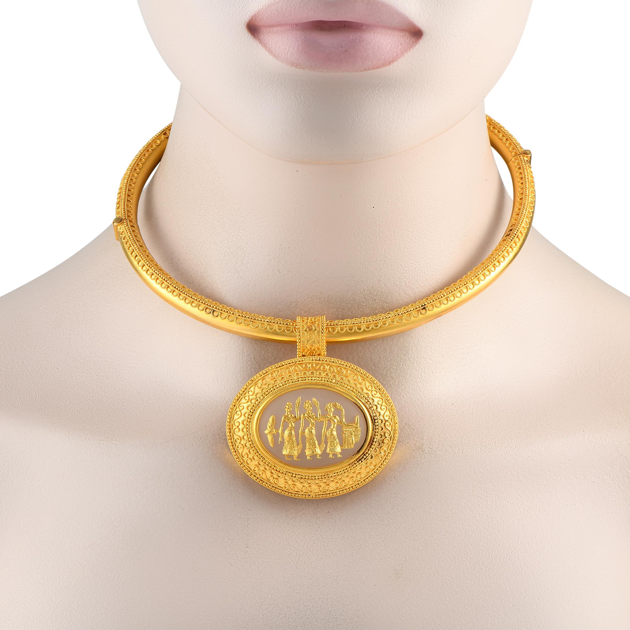 This Ilias Lalaounis necklace showcases the brands impeccable craftsmanship. Delicate detailing adds an almost lace-like quality to this pieces opulent 18K Yellow Gold setting. Greek motifs at the center of the pendant give the entire piece an old