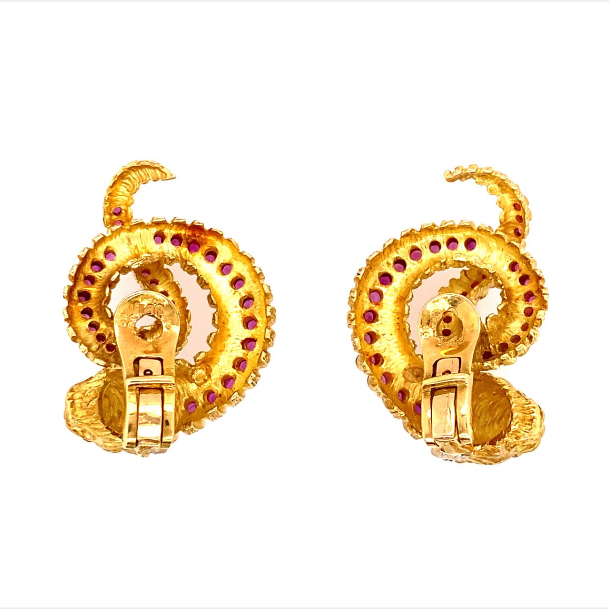 Ilias Lalaounis  Vintage clip-on Chimera earrings in 18-karat yellow gold with rubies and diamonds.
Measurements 23.44 mm x 33 mm 