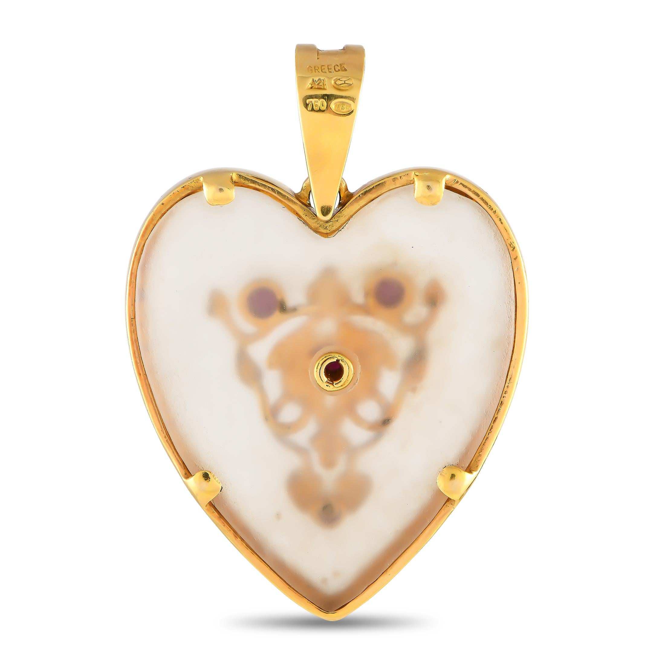 Not to miss is this exquisite creation by world-renowned Greek goldsmith, Ilias Lalaounis. This heart-shaped pendant features a matte rock crystal quartz framed in 18K yellow gold. At the heart's center is a decorative pattern punctuated by