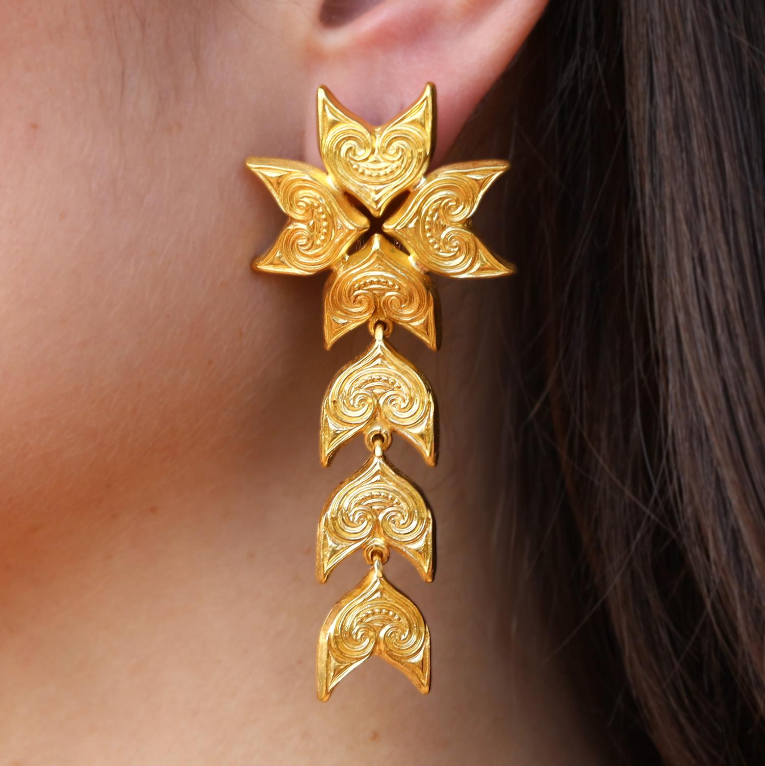Featured in his 1984 book Metamorphoses, these stunning statement earrings by Ilias Lalaounis dance with attractive pull. Inspired by ivy leaves at the Mycenaean Palace of Nestor at Pylos. We love the deep, rich color and tone of the high karat 22k