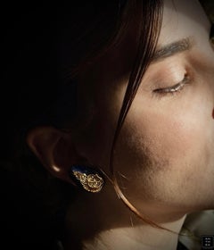 ILIAS LALAOUNIS. A Pair of gold and sodalite earrings.