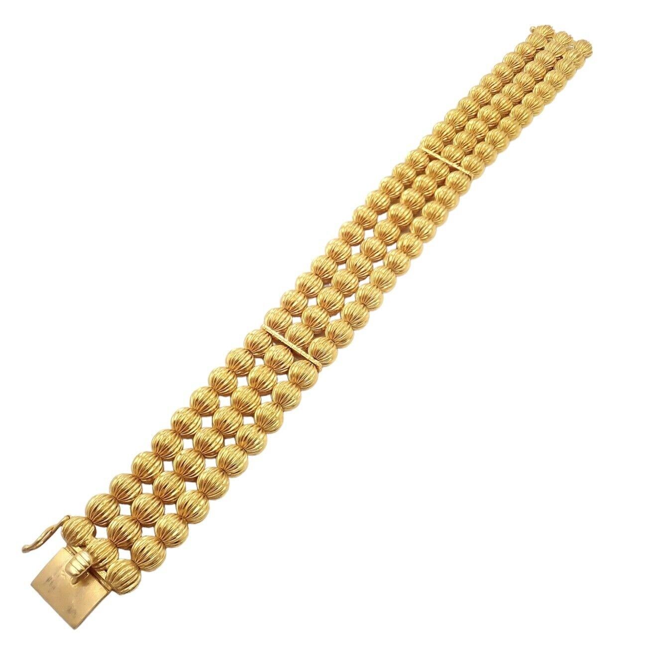 18k Yellow Gold Carved Bead Ball Bracelet by Ilias Lalaounis Greece.
Details: 
Length 8