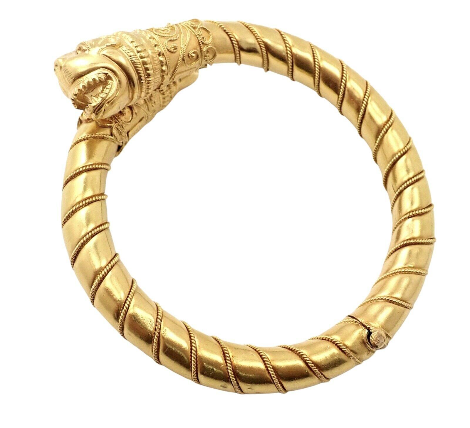 18k Yellow Gold Chimera Bangle Bracelet from Illias Lalaounis. 
Details: 
Weight: 40.7 grams
Length: 7
