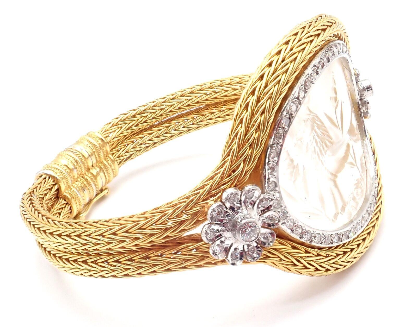 18k Yellow Gold Diamond Rock Crystal Bangle Bracelet by Illias Lalaounis Greece. 
With Round brilliant cut diamonds total weight approximately 1.5ct
Large oval rock crystal 34mm x 24mm
Details: 
Weight: 76.3 grams
Length: fits 6.75