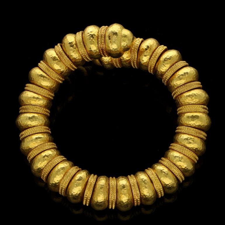 Hellenistic Ilias Lalaounis Gold Bead Open Sprung with Hammered Finish and Textured Bracelet