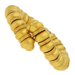 Ilias Lalaounis Gold Bead Open Sprung with Hammered Finish and Textured Bracelet