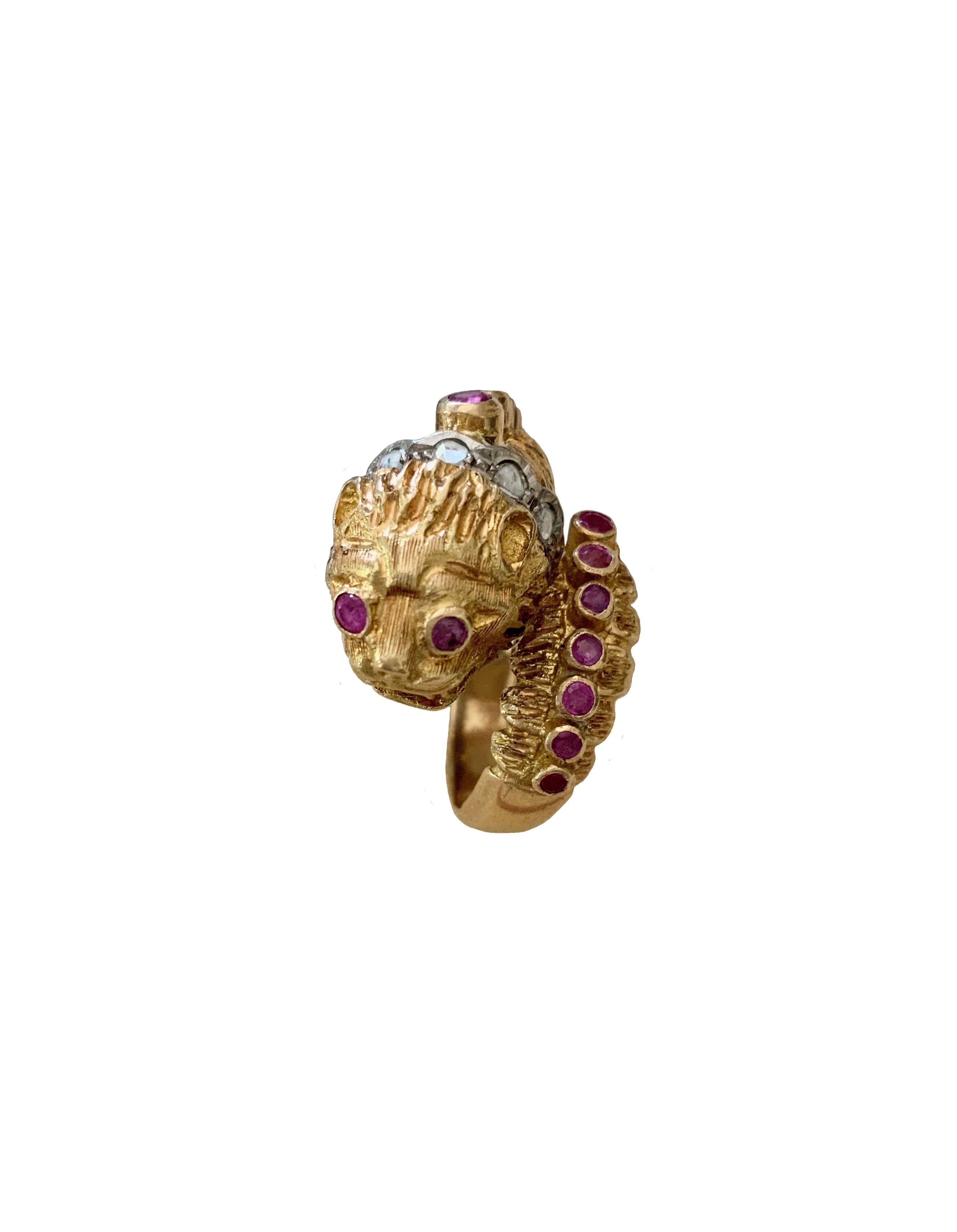 Beautiful signature ring from famous Greek jeweller Ilias Lalaounis. 
Called Chimera with a lion's head and a snake's body, it is made of yellow and white gold (around the neck).
A classic and timeless piece.
 
Metal: 18K Yellow gold
Diamonds: 5